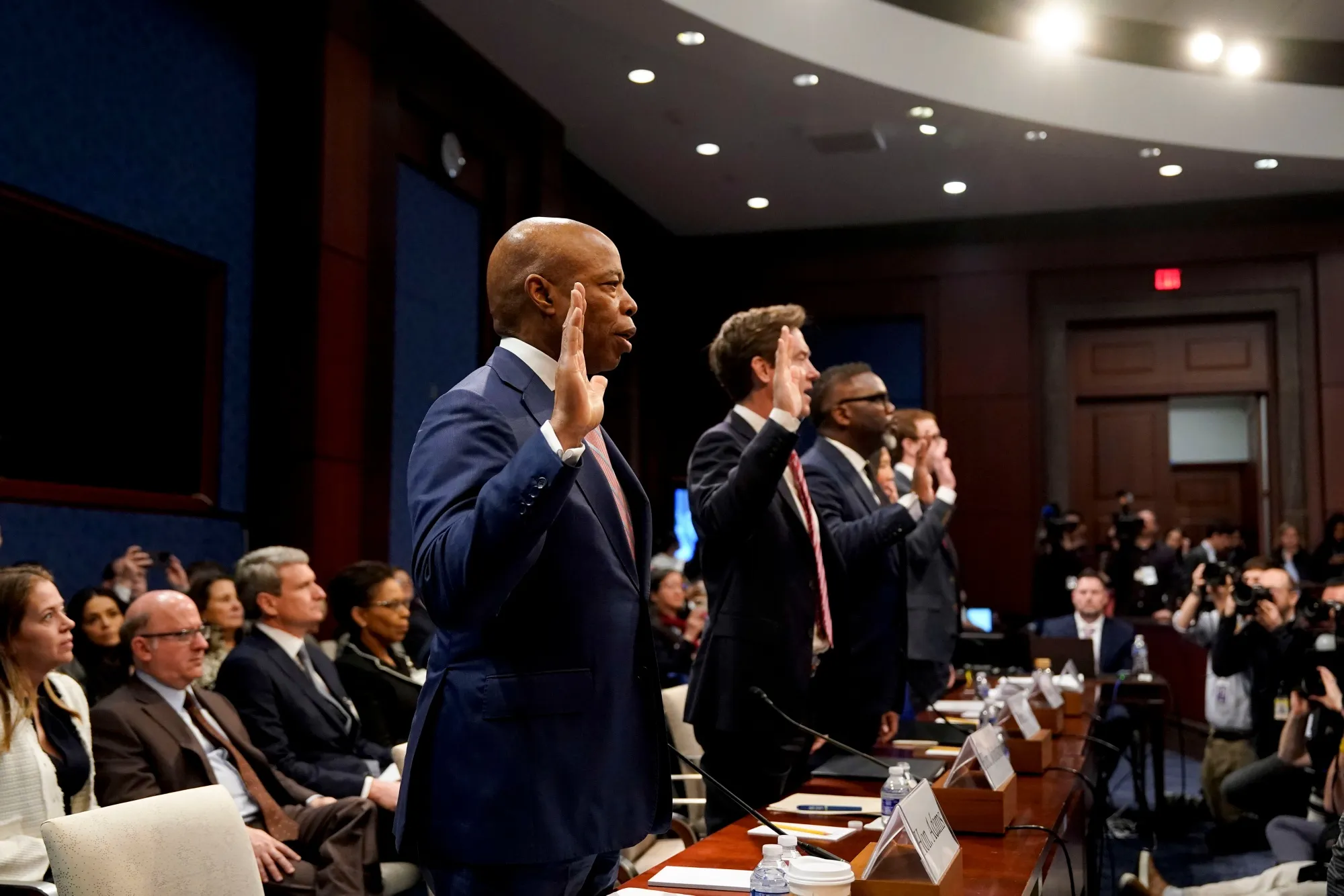 Eric Adams,&nbsp;from left, Mike Johnston, Brandon Johnson,&nbsp;and Michelle Wu are sworn in during a House Oversight and Governmental Affairs Committee hearing on March 5.