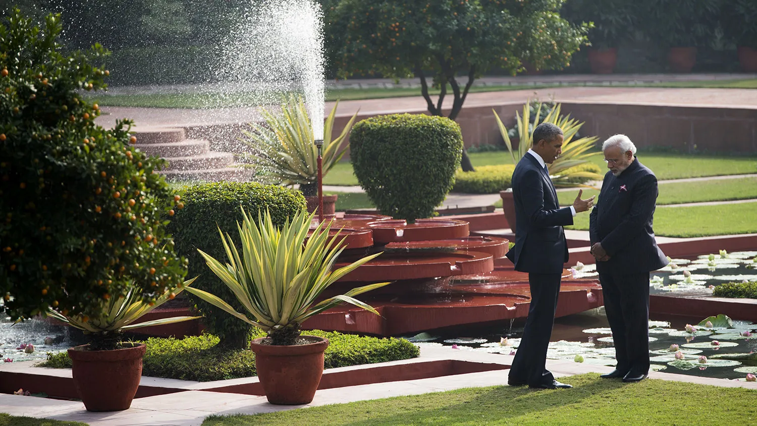 Indian Prime Minister Narendra Modi and U.S. President Barack Obama talk in the gardens between meetings at Hyderabad House in New Delhi on Jan. 25, 2015.
