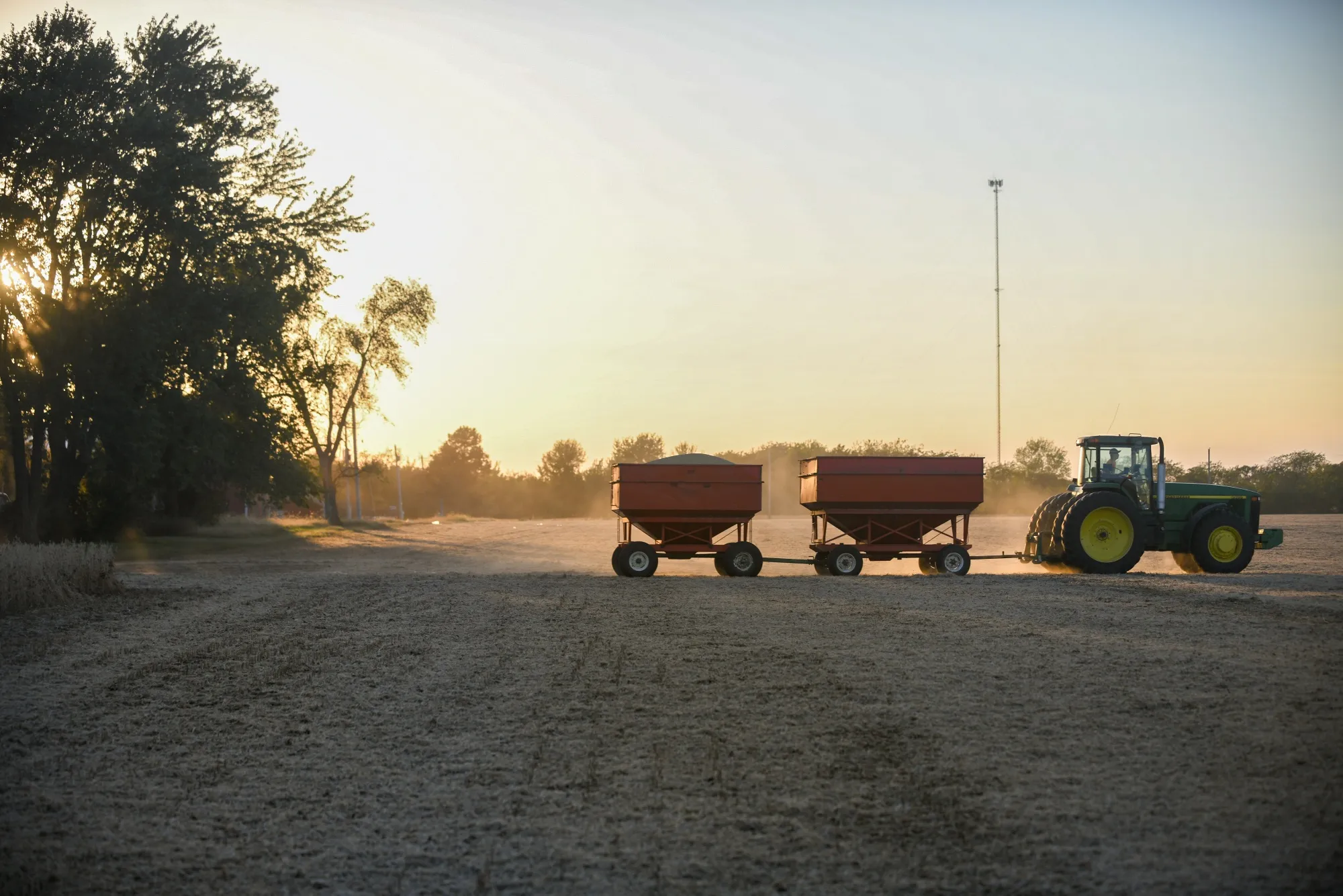 Carts of harvested soybeans are driven to a grain bin in Trenton, Missouri this month.&nbsp;