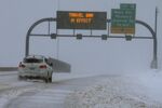 An intrepid Boston motorist negotiates winter weather in 2015.