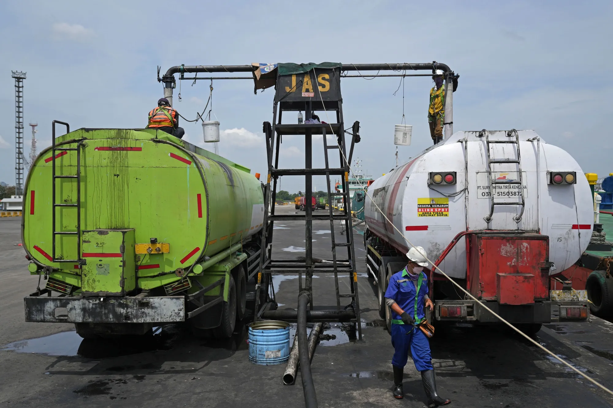 Palm oil loaded into trucks at Tanjung Priok Port in Jakarta.