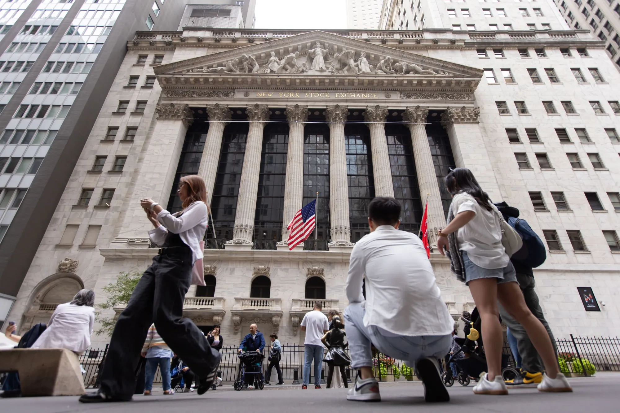 Pedestrians near the New York Stock Exchange.