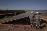 Contractors work on a solar farm in Sao Paulo, Brazil. 
