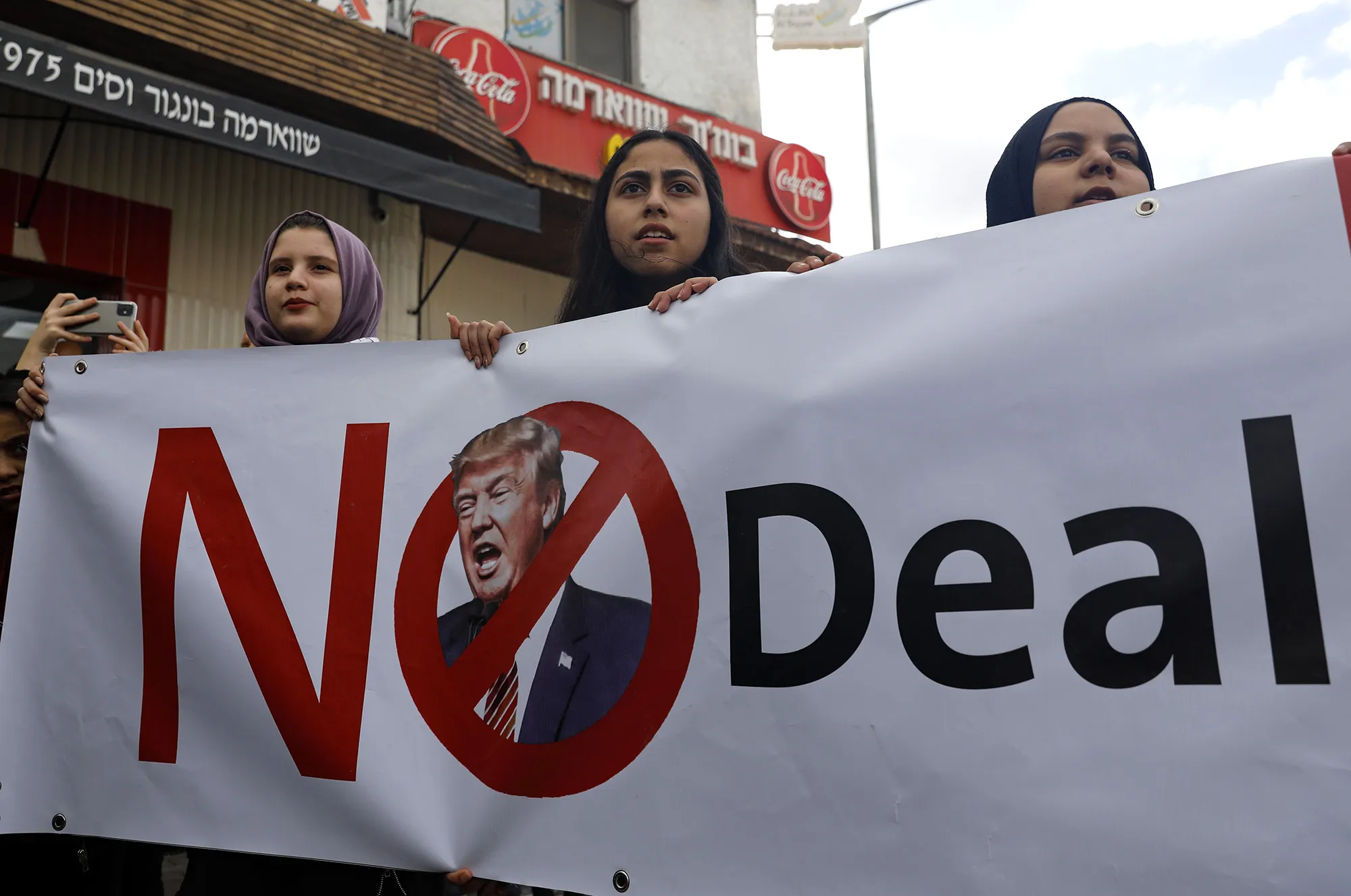People rally in opposition to the U.S.-brokered proposal in Baqa al-Gharbiya, northern Israel on Feb. 1.