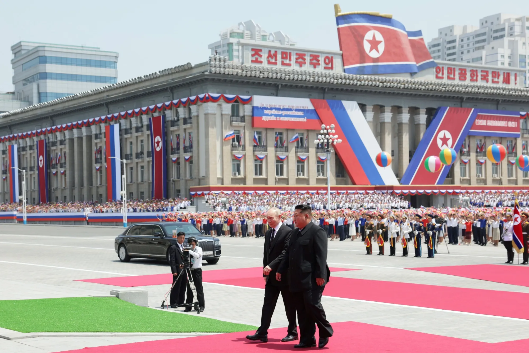 Kim Jong Un and Vladimir Putin in Pyongyang in a photo released by Russian state media on June 19.