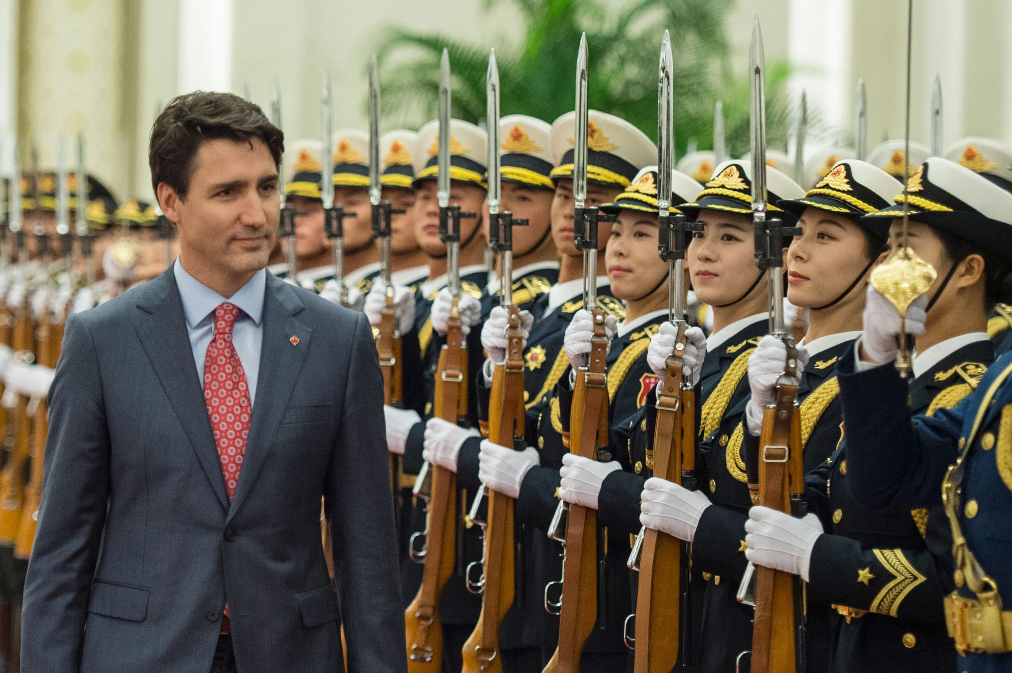 Trudeau reviews a Chinese honor guard&nbsp;on a trip to Beijing in December 2017.