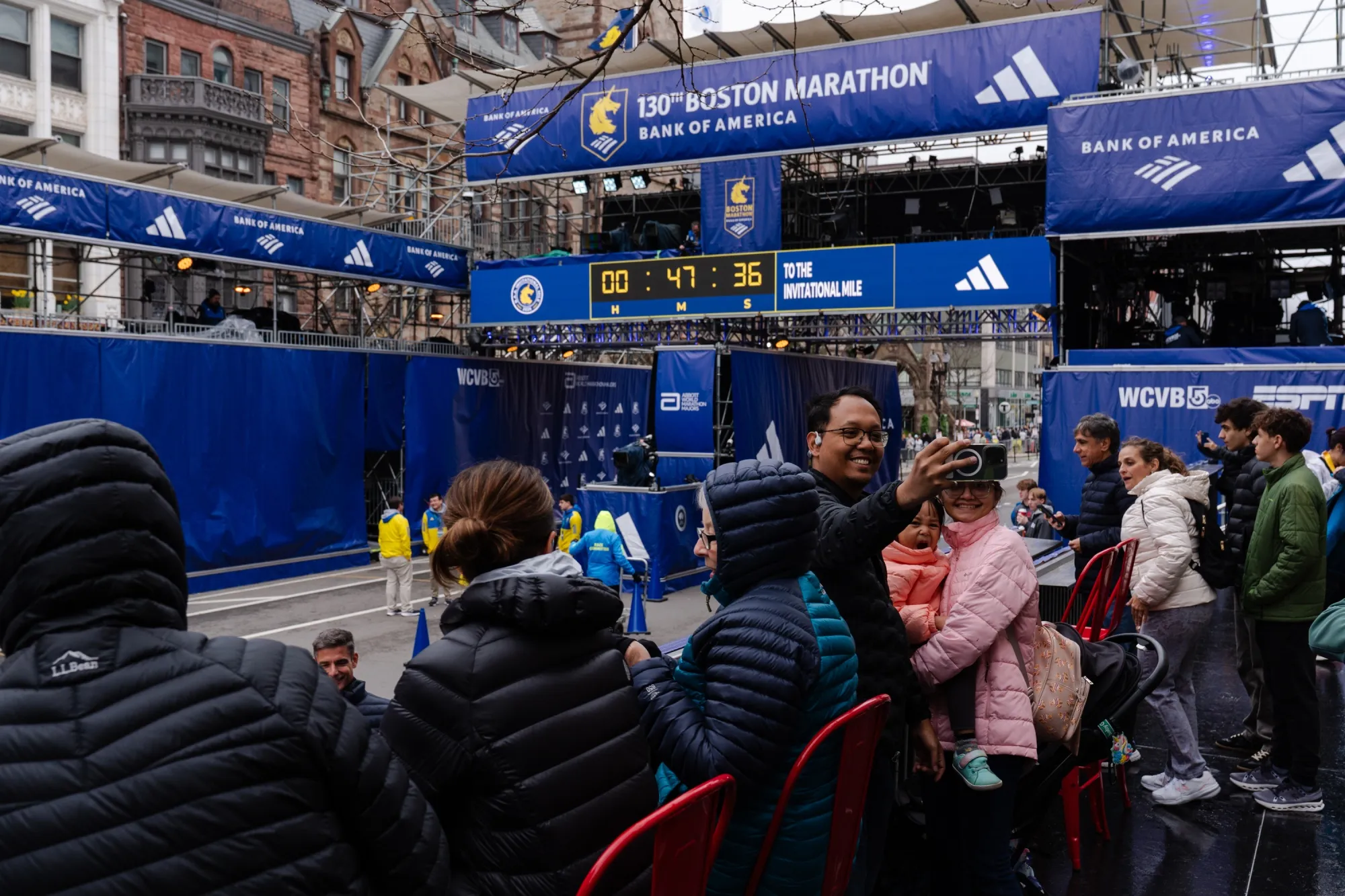 People gather at the finish line of the Boston Marathon on April 18.