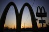 Signage is displayed outside a McDonald's Corp. fast food restaurant at sunset in Shepherdsville, Kentucky, U.S., on Monday, Jan. 14, 2019. McDonald's is scheduled to release earnings figures on January 30.