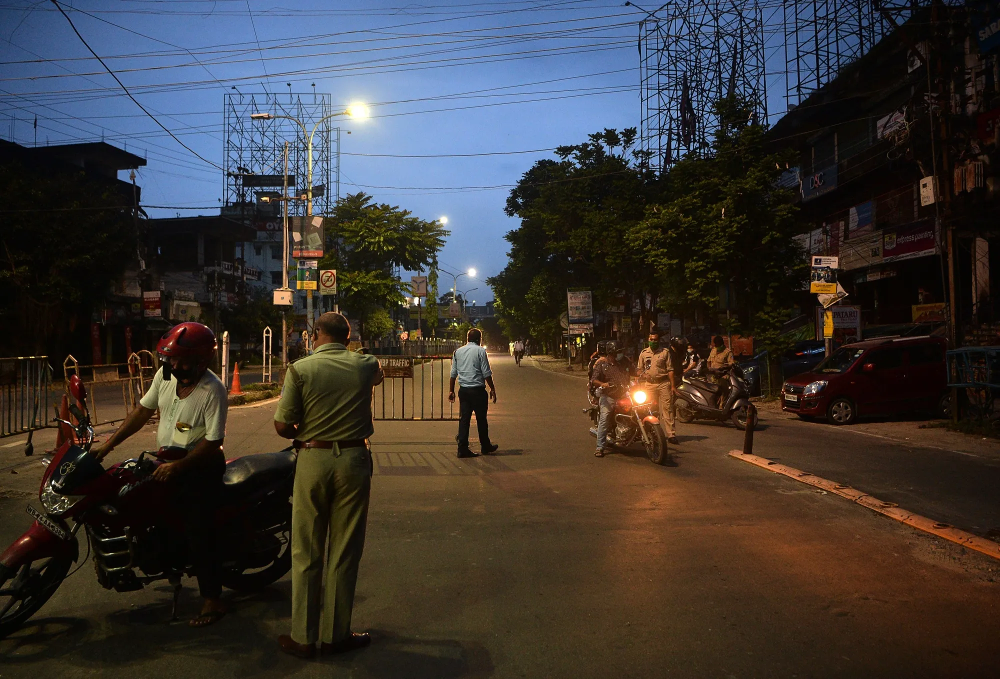 Police check vehicles during a lockdown imposed by the state government in Siliguri, Aug. 8.