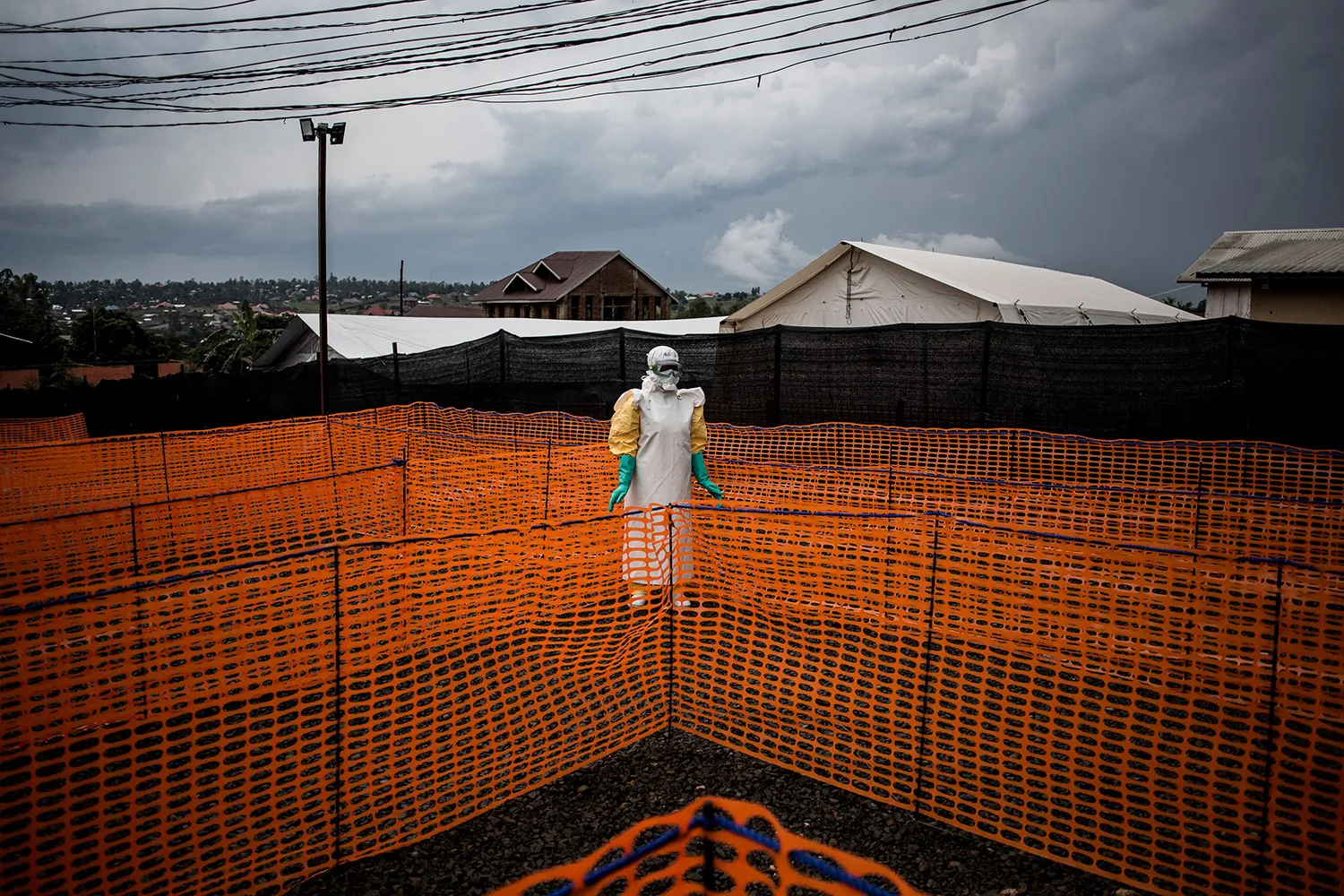 A health worker waits to handle a possible Ebola in Bunia, DRC