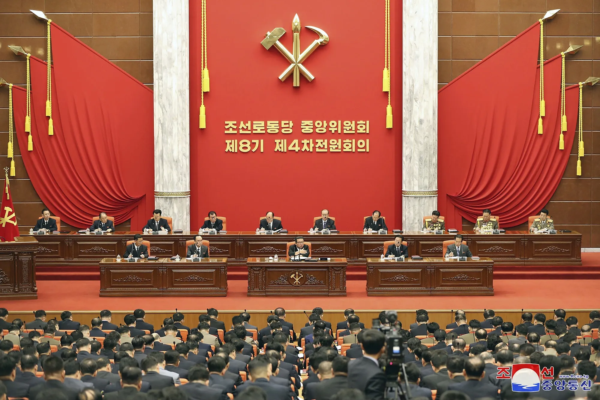Kim Jong Un, center, attends a meeting of the Central Committee of the ruling Workers’ Party in Pyongyang on Dec. 27.