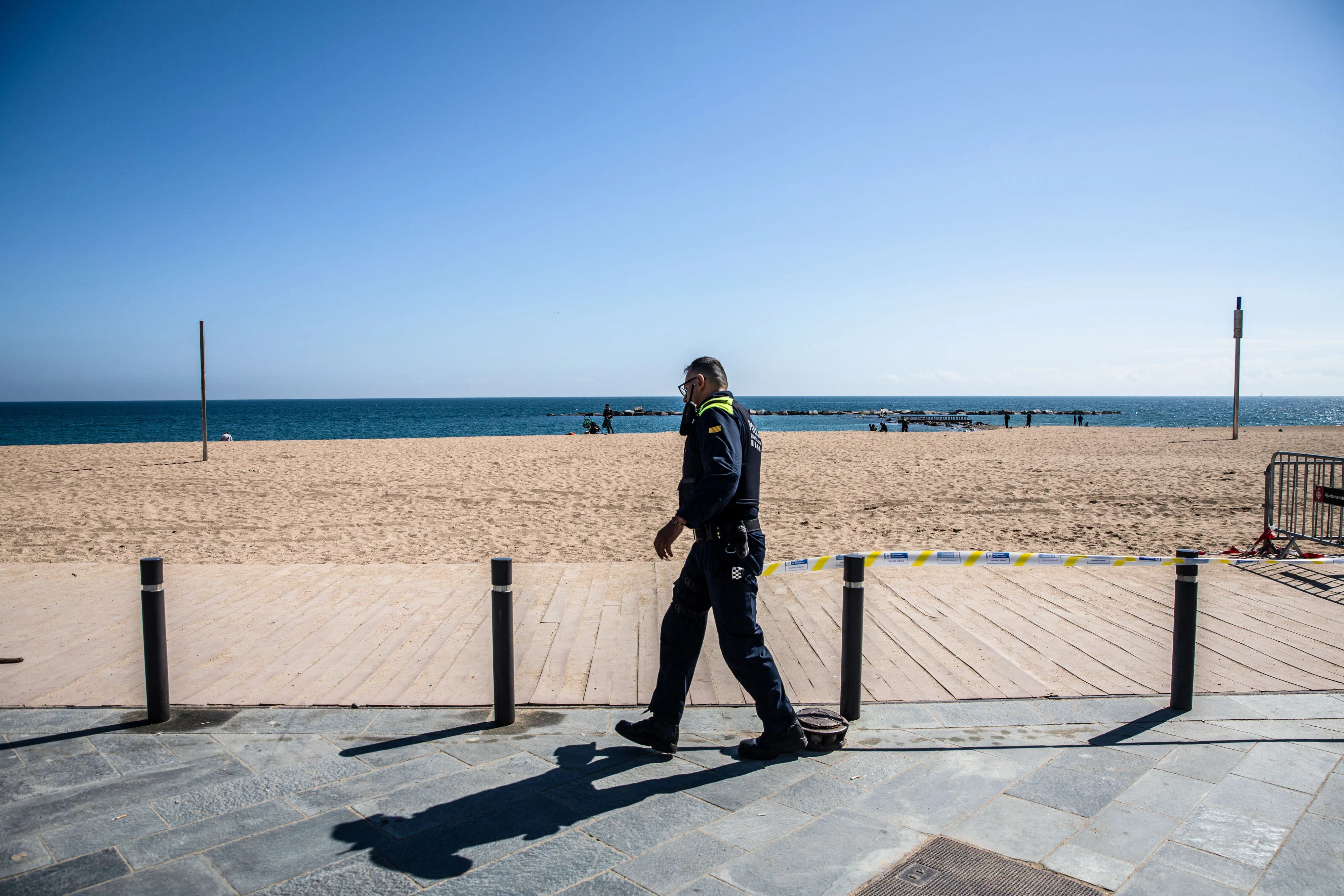 Barcelona’s beaches go quiet.