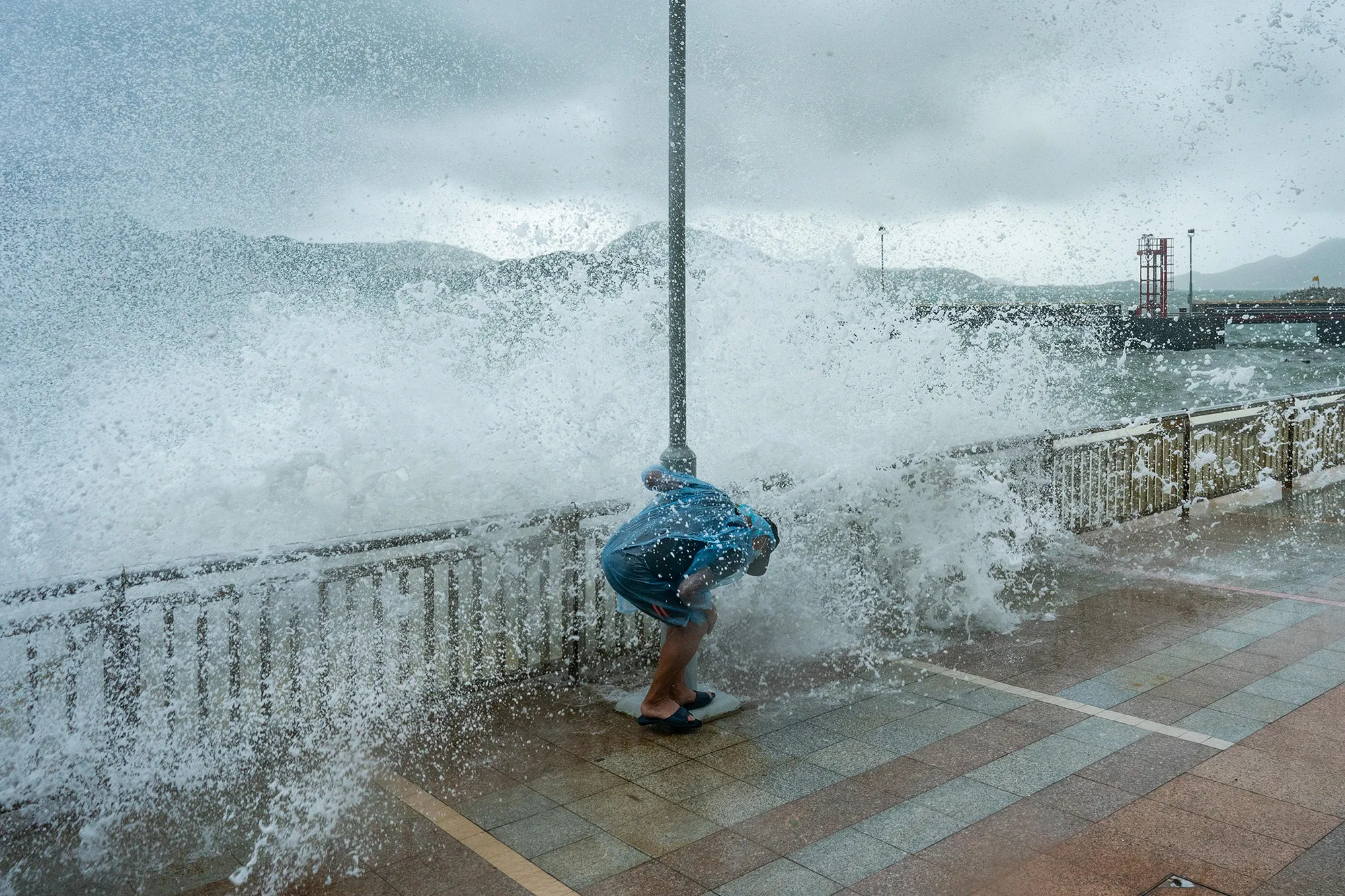 Waves crash over a promenade during Typhoon Kompasu&nbsp;&nbsp;in Hong Kong, on Oct. 13.