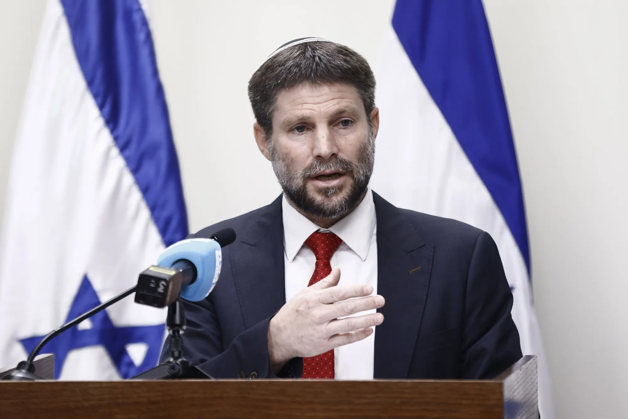 Bezalel Smotrich speaks during a news conference ahead of a swearing in ceremony at the Knesset in Jerusalem, Israel, on Tuesday, Nov. 15, 2022.