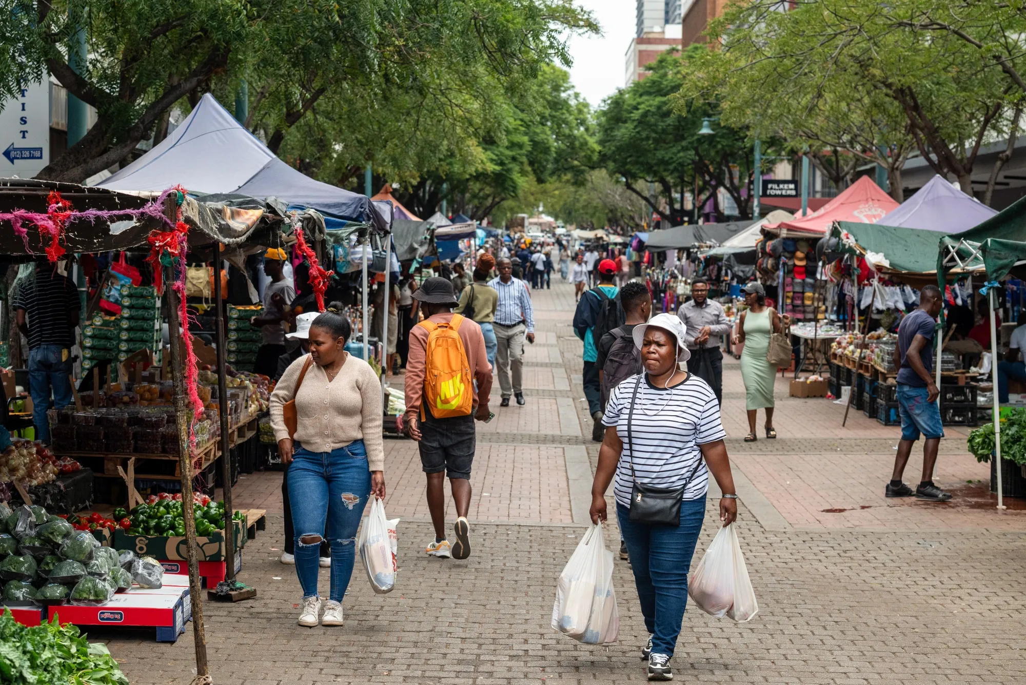 Shoppers at an outdoor market in the central business district in Pretoria, South Africa, on Feb. 18.