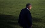 Donald Trump walks on the South Lawn before boarding Marine One at the White House in Washington, D.C.