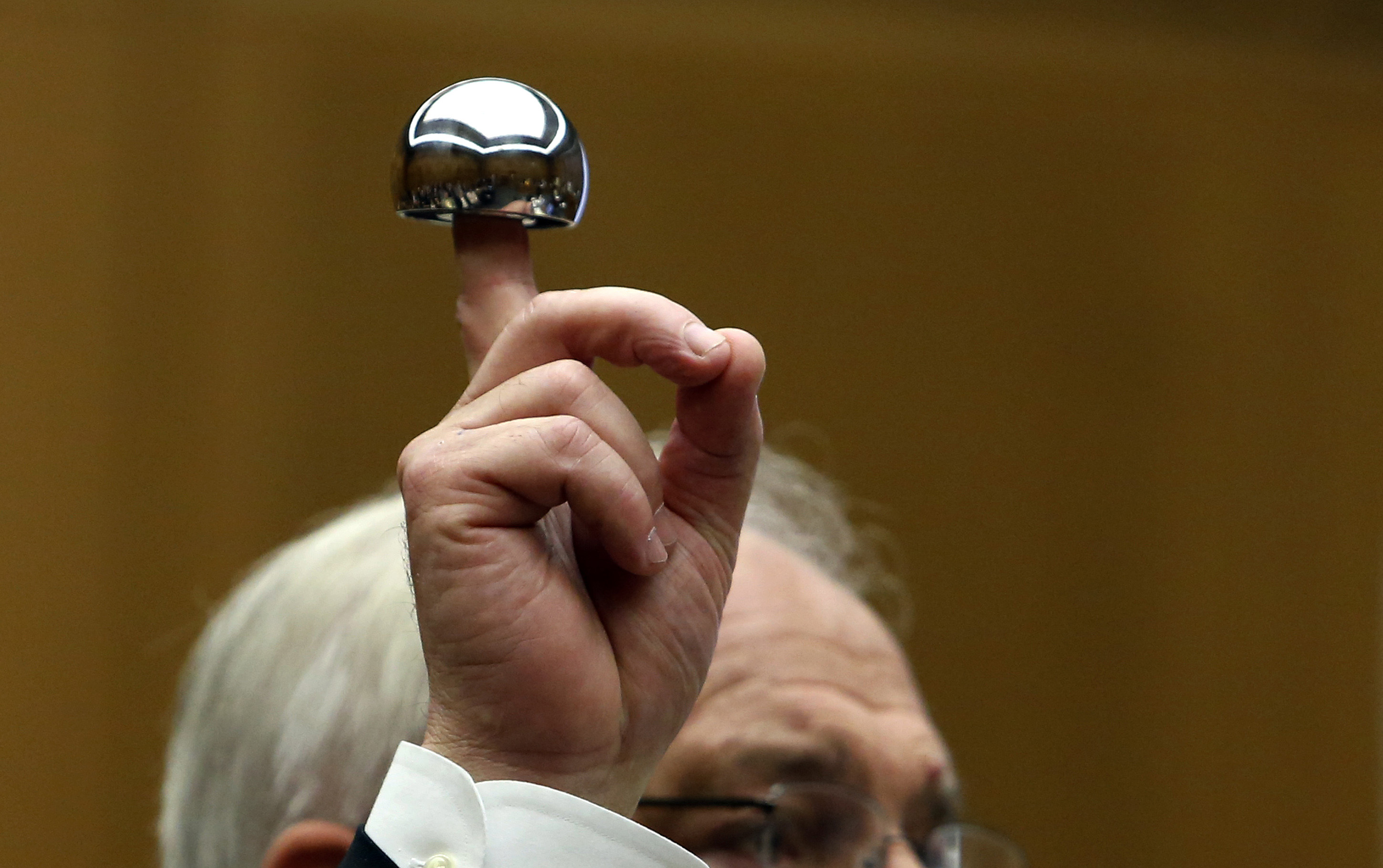 An attorney holds up a&nbsp;hip implant made by Johnson &amp; Johnson during trial at California Superior Court in Los Angeles on Jan. 25, 2013.