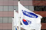 The logo of Samsung Life Insurance Co. on a flag. Photographer: SeongJoon Cho