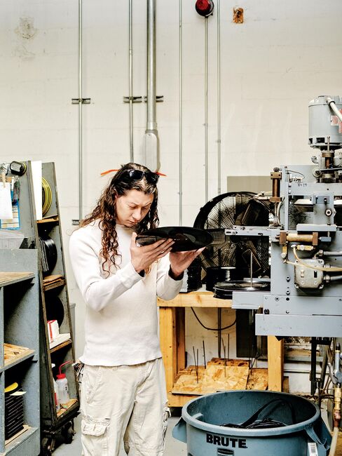 5. QRP inspects each record as it comes off of the press for visible imperfections. One out of every 50 records gets a test listen.