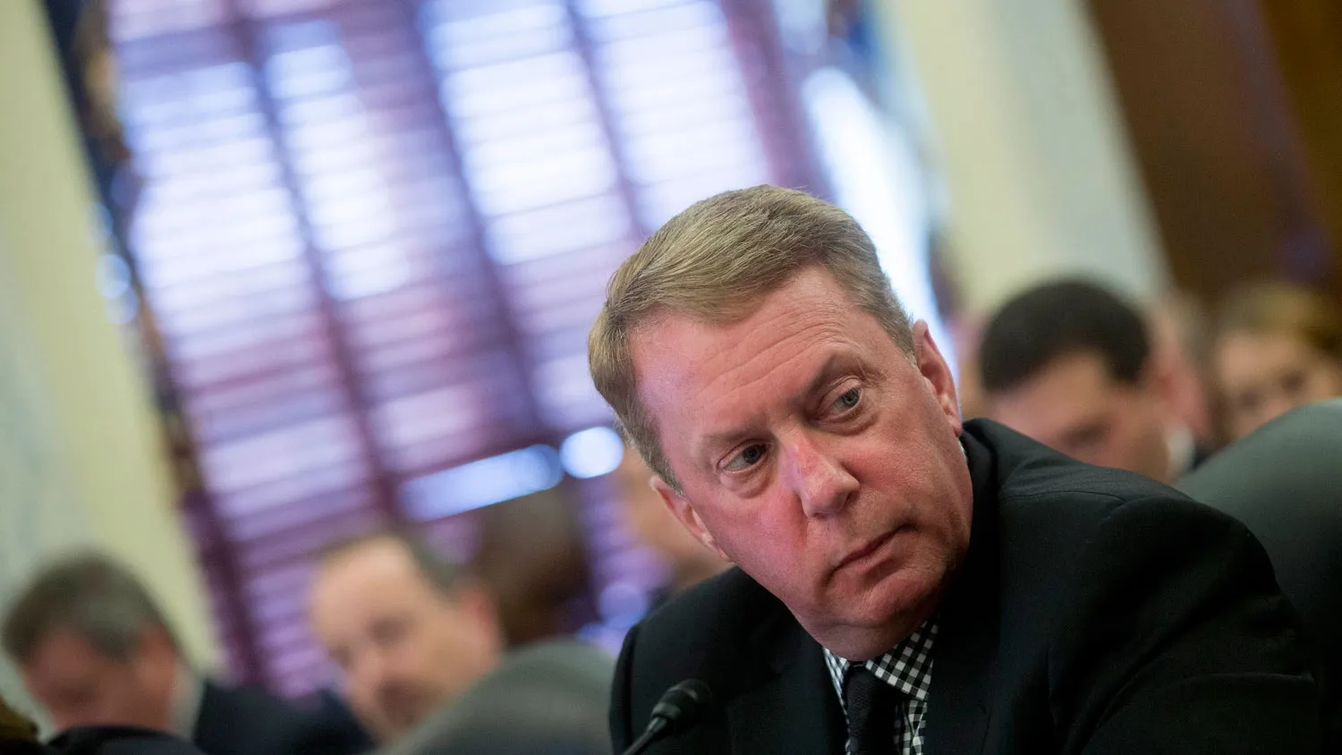 Terrence 'Terry' Duffy, chairman and president of CME Group Inc., listens during a Senate Agriculture Committee hearing in Washington, D.C., U.S., on Tuesday, May 13, 2014.
