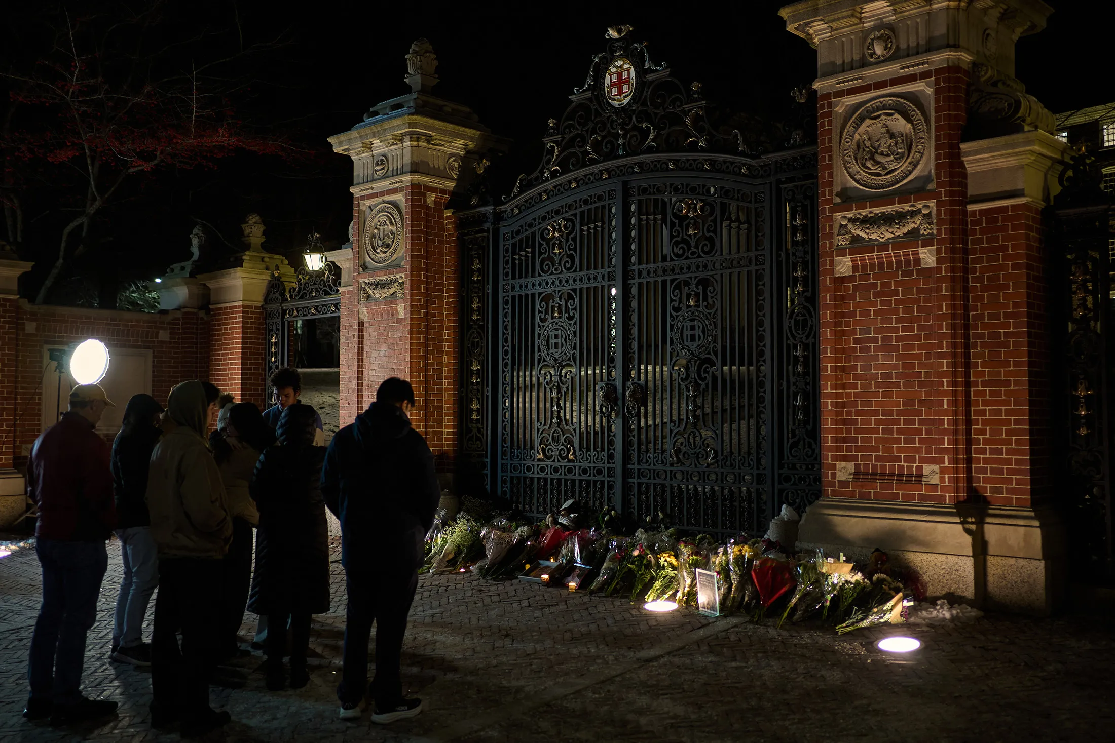 Students and community members mourn at a makeshift memorial for the shooting victims,&nbsp;in front the Van Winkle Gates at&nbsp;Brown&nbsp;University&nbsp;in Providence, Rhode Island, on Dec.&nbsp;15.