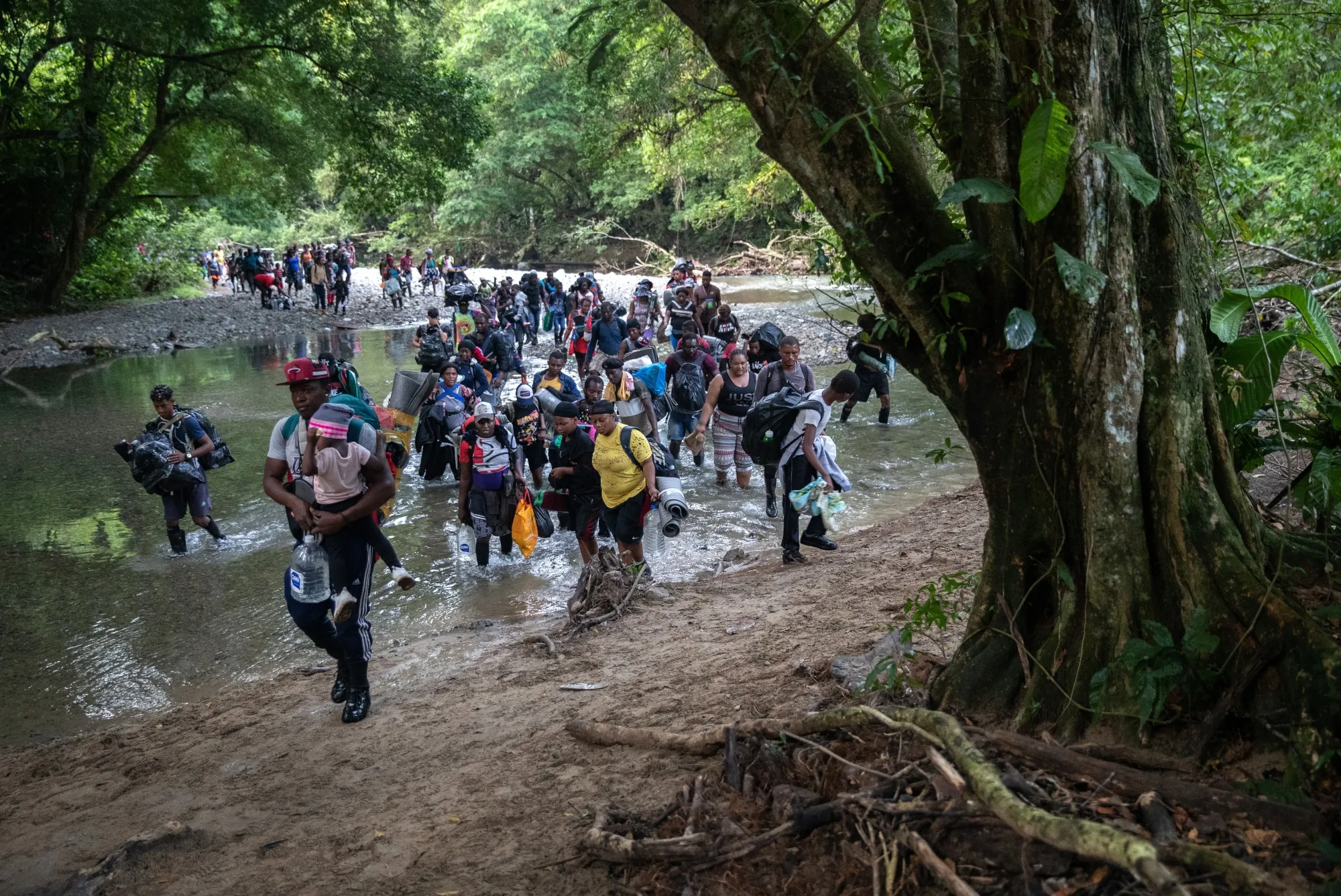 Migrants trek through the Darien Gap&nbsp;near Acandi, Colombia, in 2021.&nbsp;