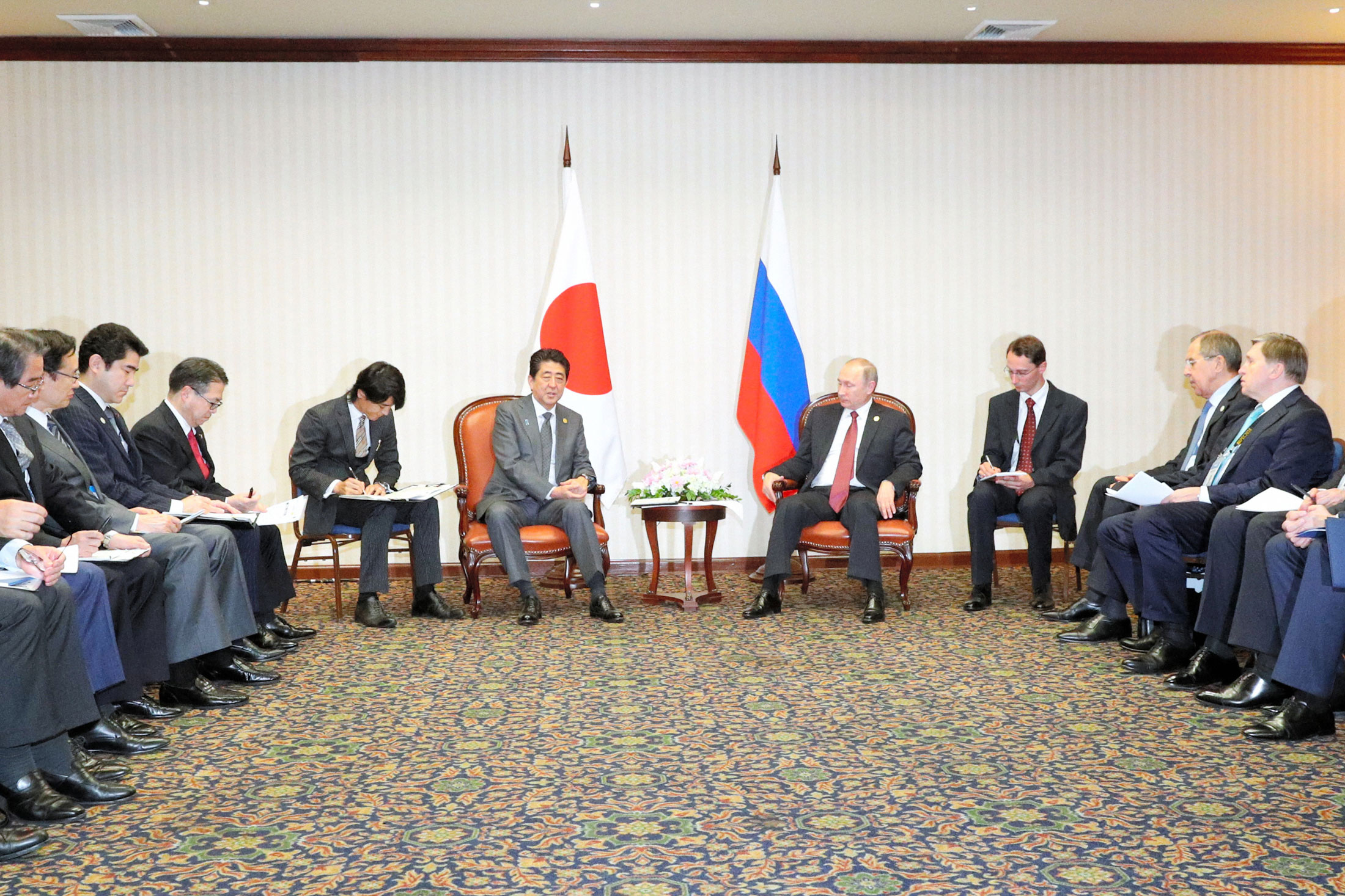 Japanese Prime Minister Shinzo Abe and Russian President Vladimir Putin meet during the APEC summit on Nov. 19.
