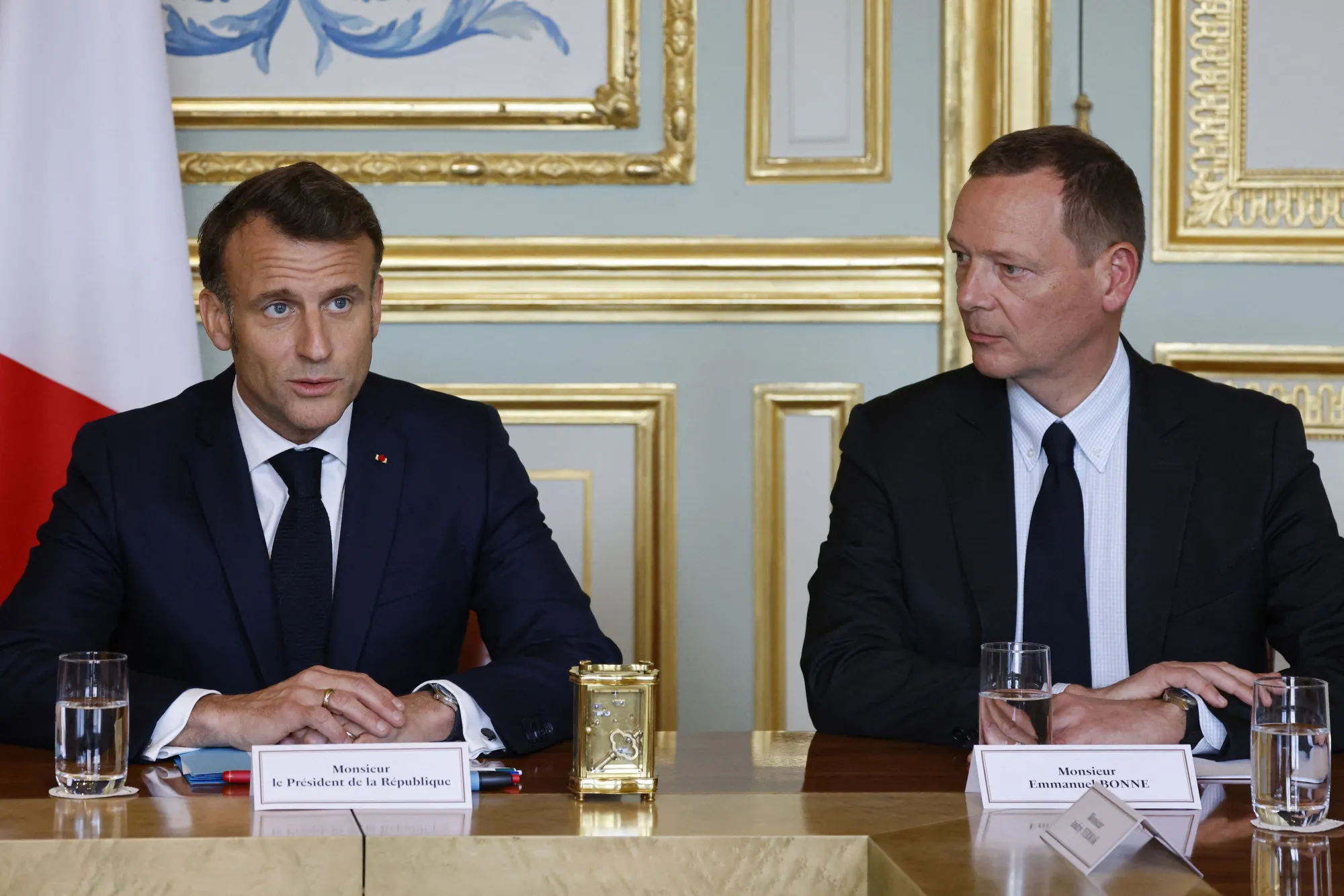 France's President Emmanuel Macron, left, and Emmanuel Bonne.