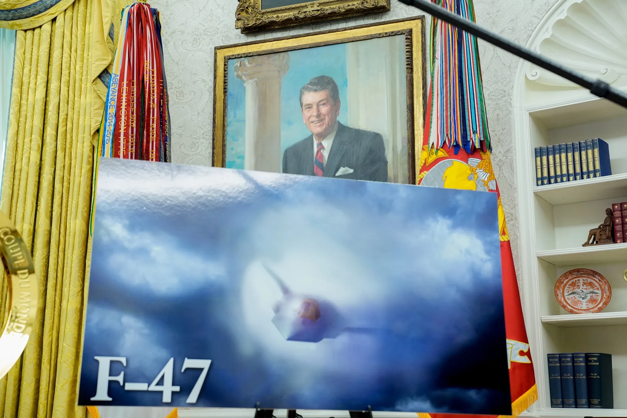 A rendering of the new F-47 fighter jet displayed in the Oval Office, March 21. Boeing won a contract to design and build the US's next-generation fighter jet, beating out rival Lockheed Martin for the multibillion dollar program.