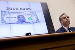 A Zuck Buck is displayed on a monitor as David Marcus, head of blockchain with Facebook Inc., right, is questioned by Representative Brad Sherman, a Democrat from California, not pictured, during a House Financial Services Committee hearing in Washington, D.C., U.S., on Wednesday, July 17, 2019. 