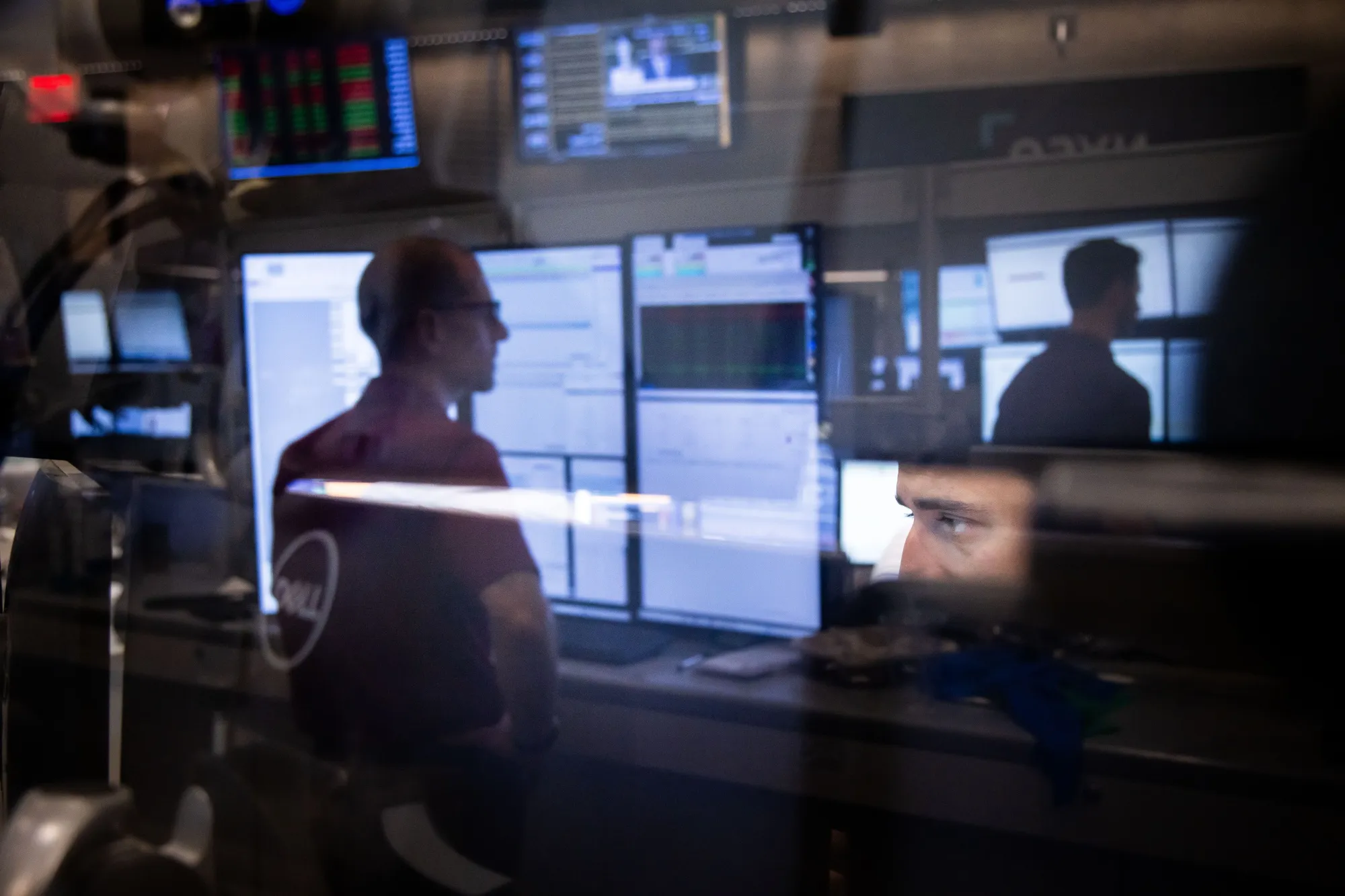 Traders work at the New York Stock Exchange.
