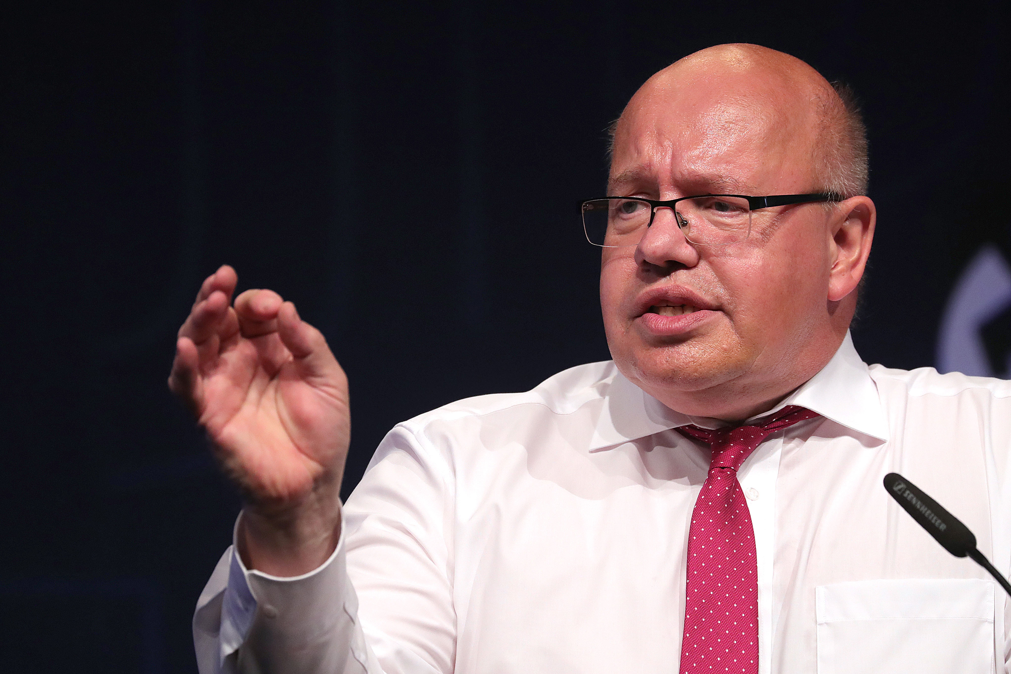 Peter Altmaier, Germany's economy minister, gestures while speaking at the Federation of German Industries (BDI) conference in Berlin, Germany, on Tuesday, June 4, 2019. German Chancellor Angela Merkel blasted the European Union's merger rules for failing to take into account growing Chinese dominance and hampering efforts to compete on the global stage.