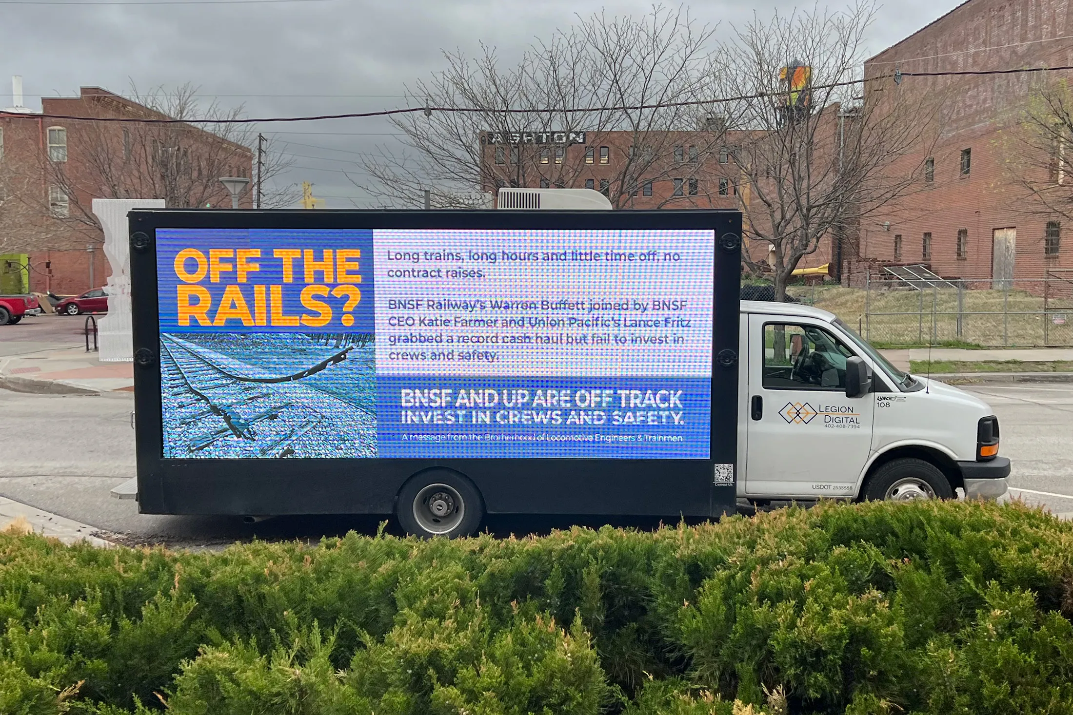 The union showcases a mobile billboard on Friday, April 29. The group plans to display the billboard, calling for action from BNSF, outside of Berkshire’s meeting on Saturday.