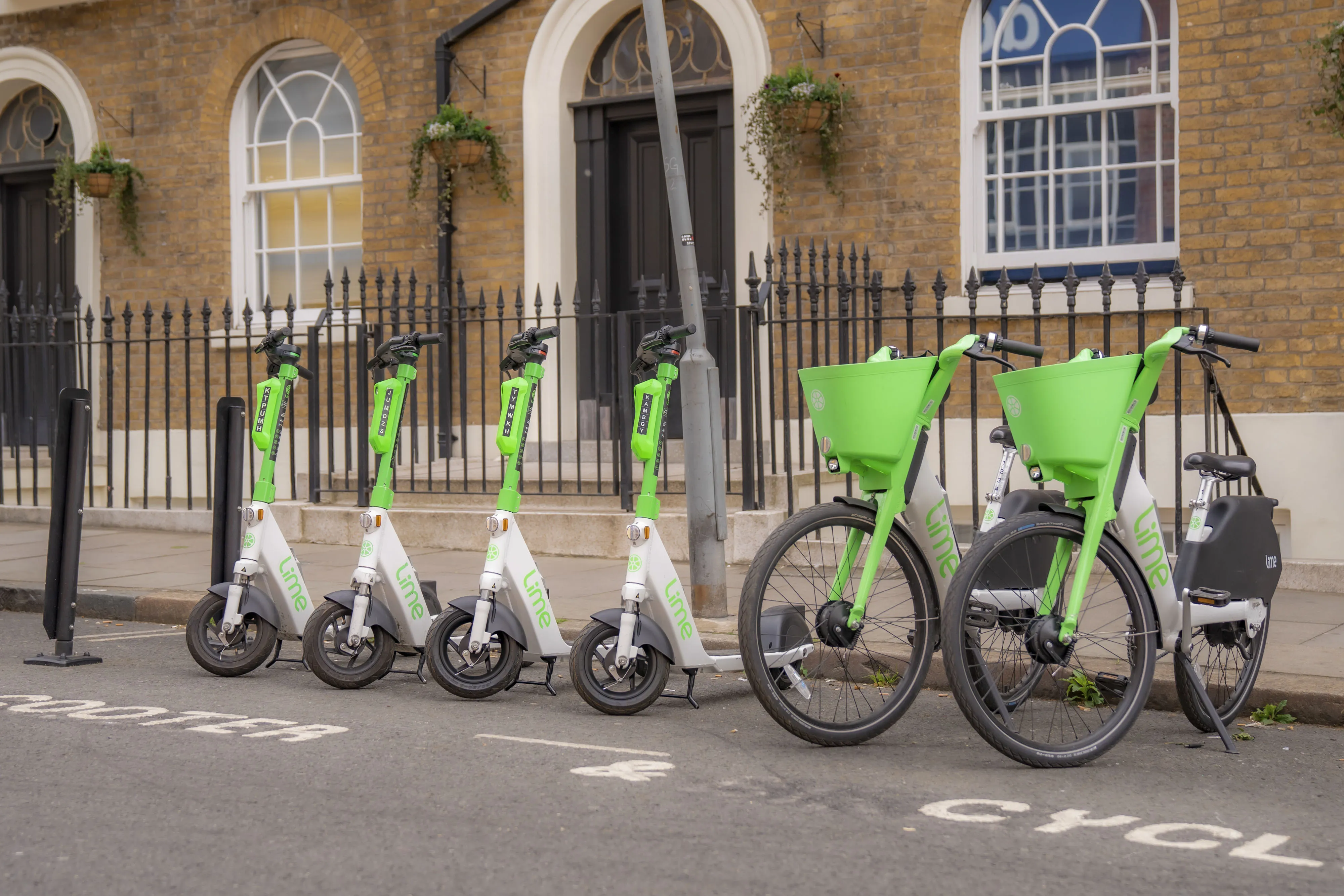 Lime bikes and scooters in London.