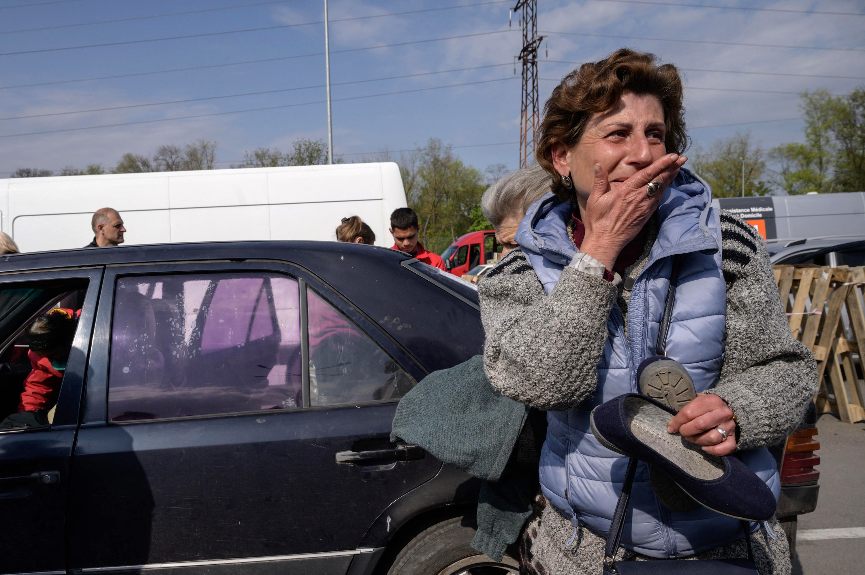 A woman arrives from Mariupol&nbsp;at a registration and processing area for internally displaced people in Zaporizhzhia, Ukraine, on May 2.