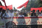 People march to the parliamentary building during a protest in Islamabad, Pakistan, on Oct. 14.