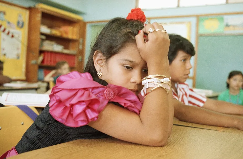 Fourth-graders Rocio Belmontes and Juan Patino attend class in Naranja, Florida. 