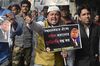 A youth Congress activist protest against Trump's decision to ban nationals from seven predominantly Muslim countries to the US in Jan. 2017.
