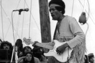 Jimi Hendrix performing at the Woodstock Music Festival