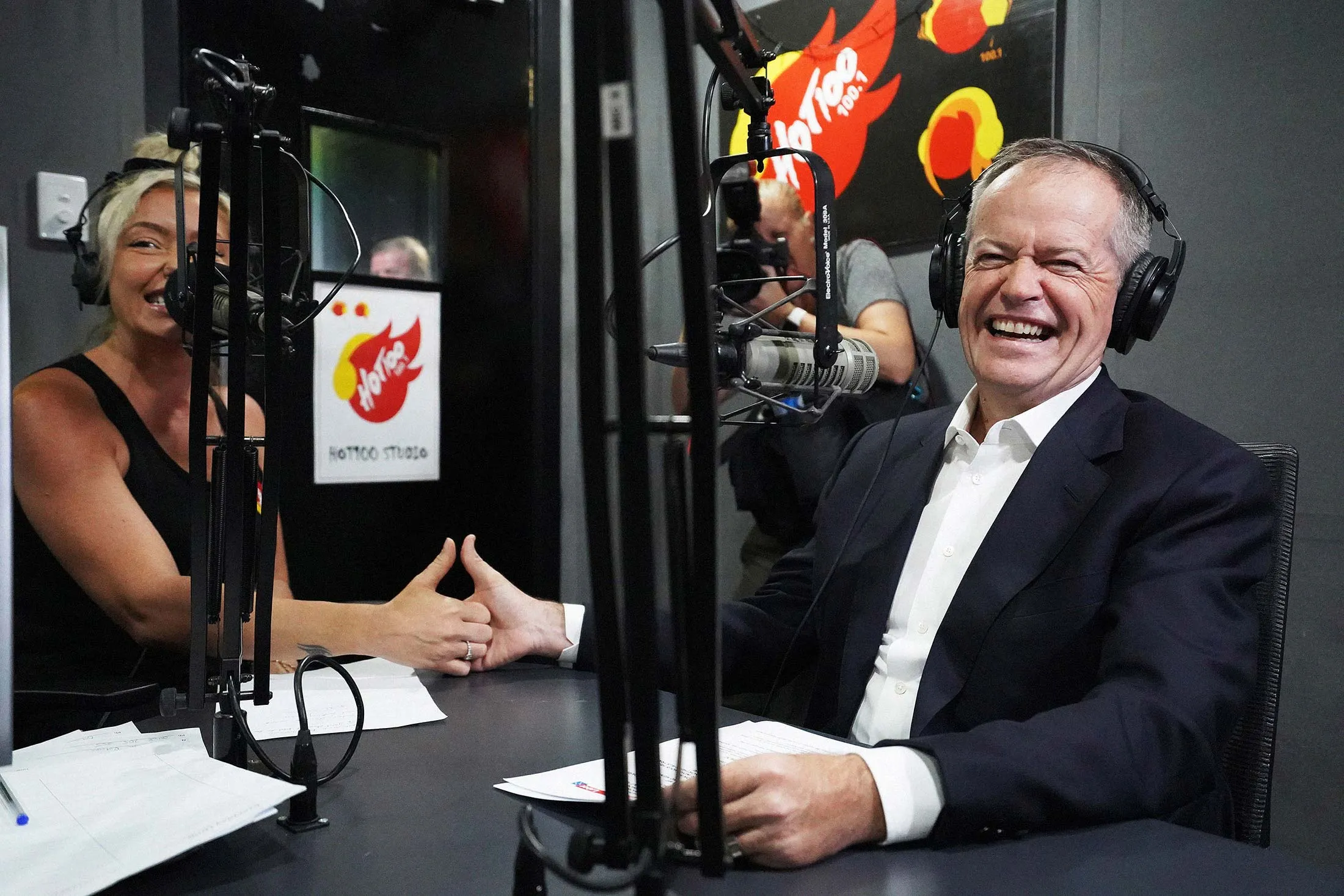 Australian opposition leader Bill Shorten has a thumb war with radio host Dannii on April 18 in Darwin, Australia.