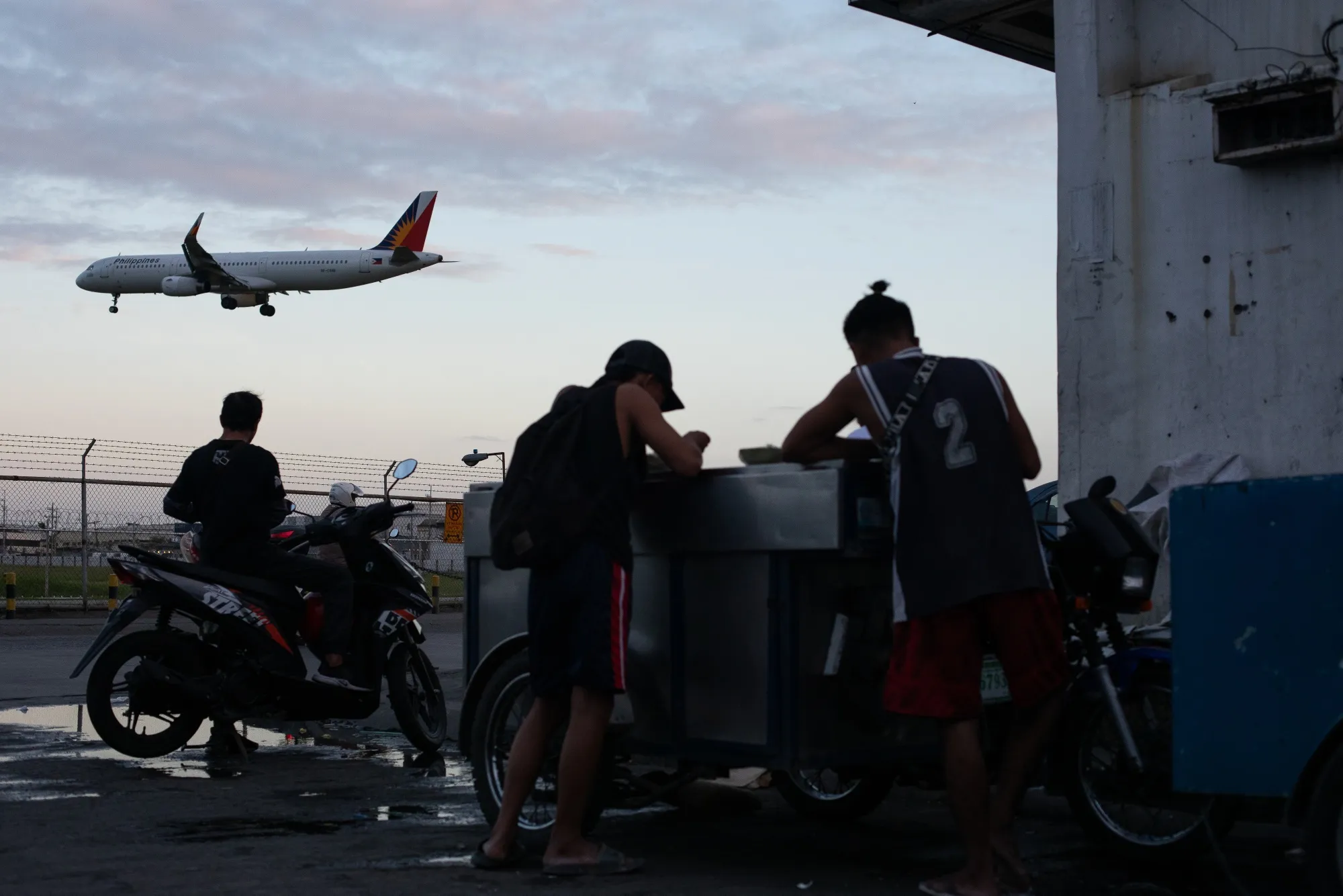 A Philippine Airlines jet prepares to land at Ninoy Aquino International Airport in Manila.