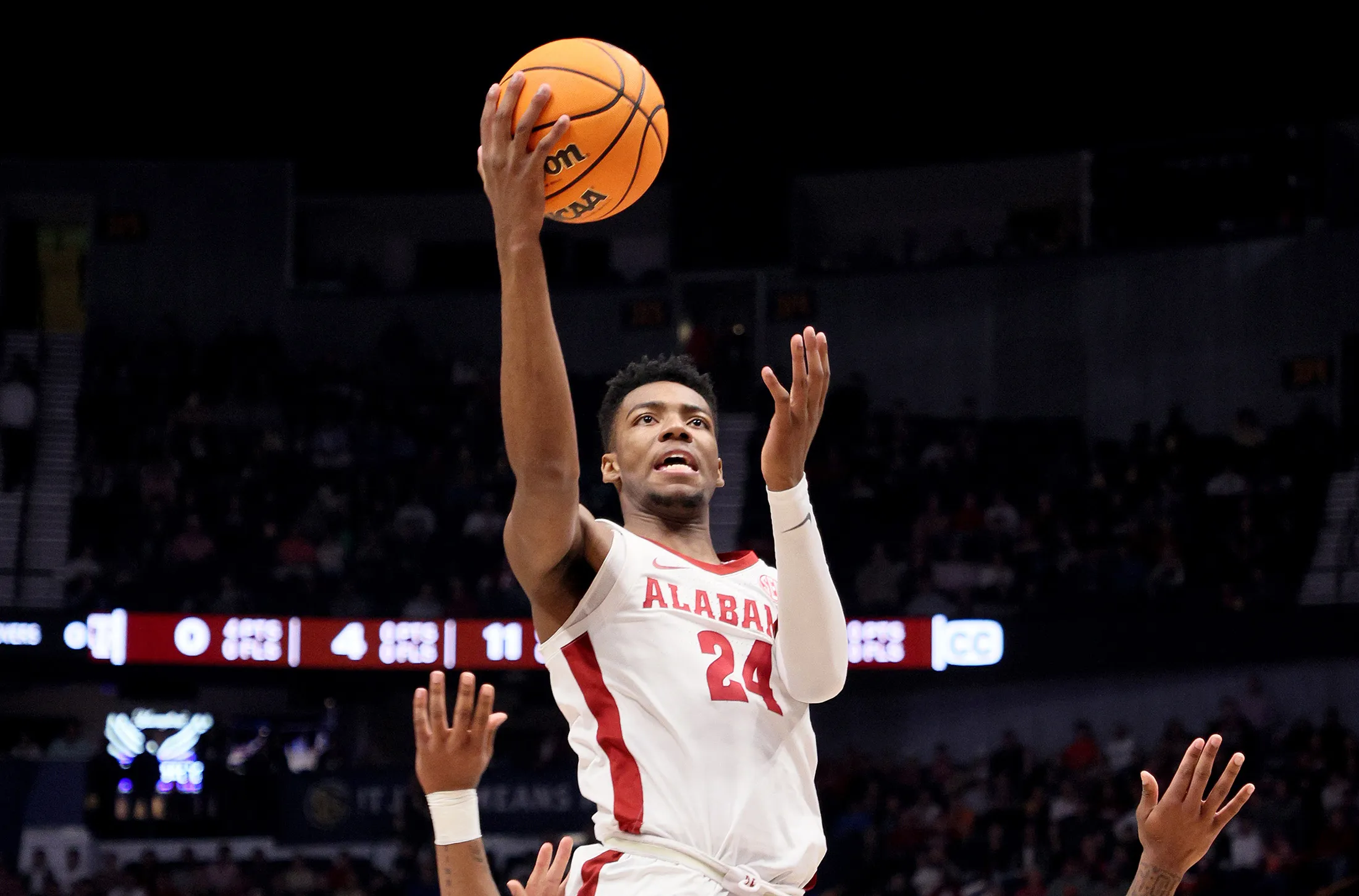 Brandon Miller of the Alabama Crimson Tide lays up a basket&nbsp;during the 2023 SEC Basketball Tournament final on March 12.