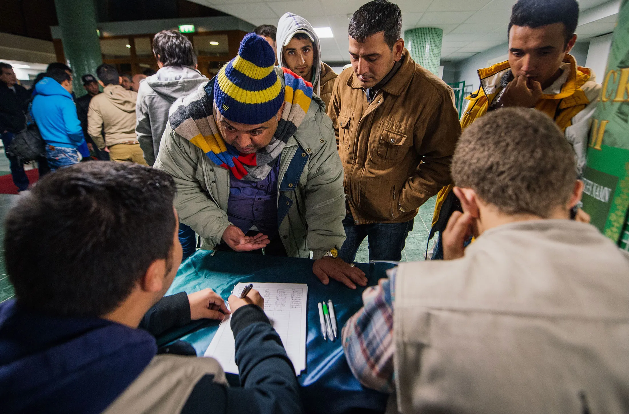 Refugees register at Stockholm central mosque on Oct. 15, 2015.
