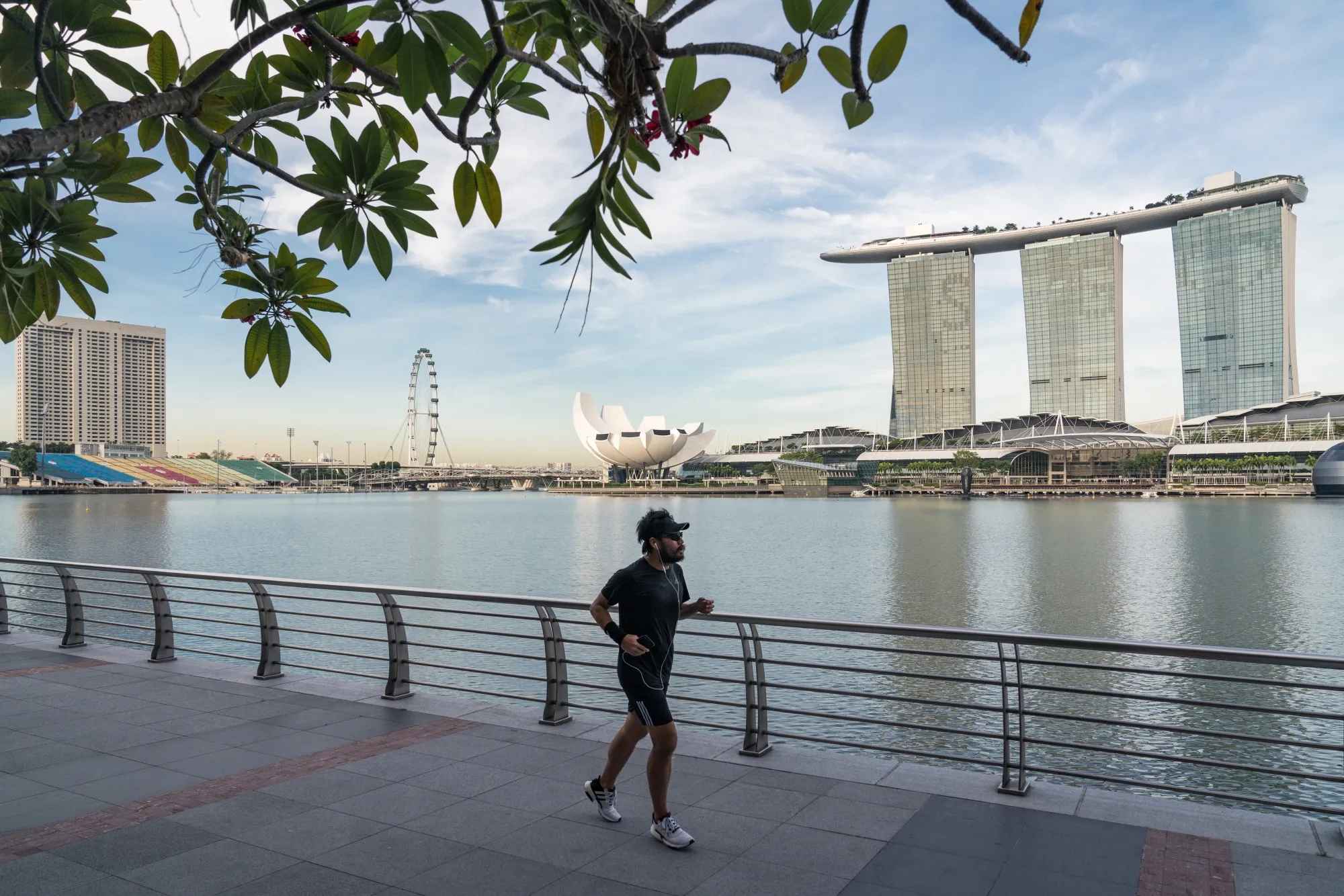 A jogger runs in a near-empty Merlion Park during the "circuit breaker" lockdown in Singapore, on May 20.