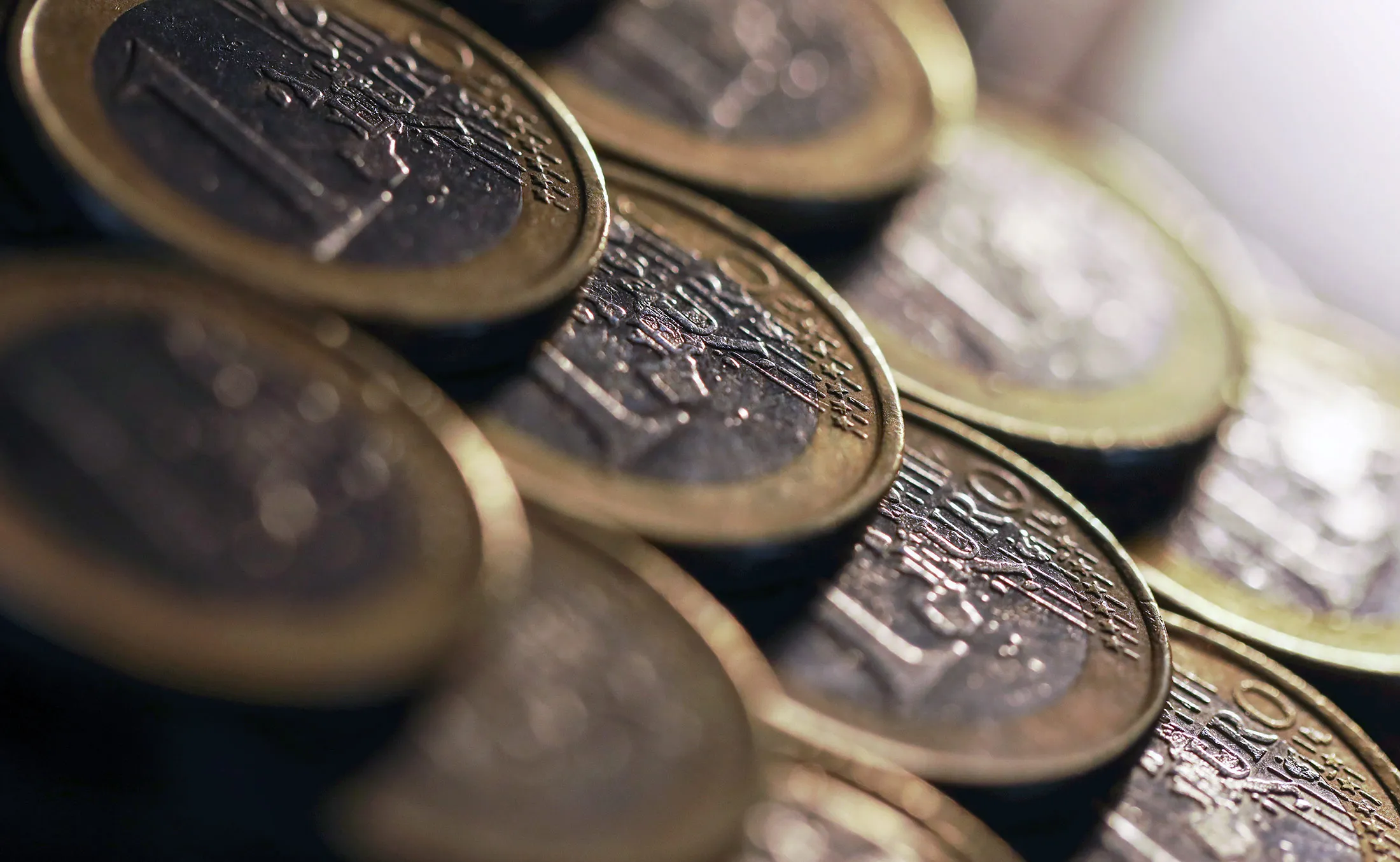 One euro coins sit stacked in this arranged photograph in London, U.K., on Tuesday, Sept. 19, 2017. The euro climbed 0.3 percent to $1.1986, the strongest in more than a week.
