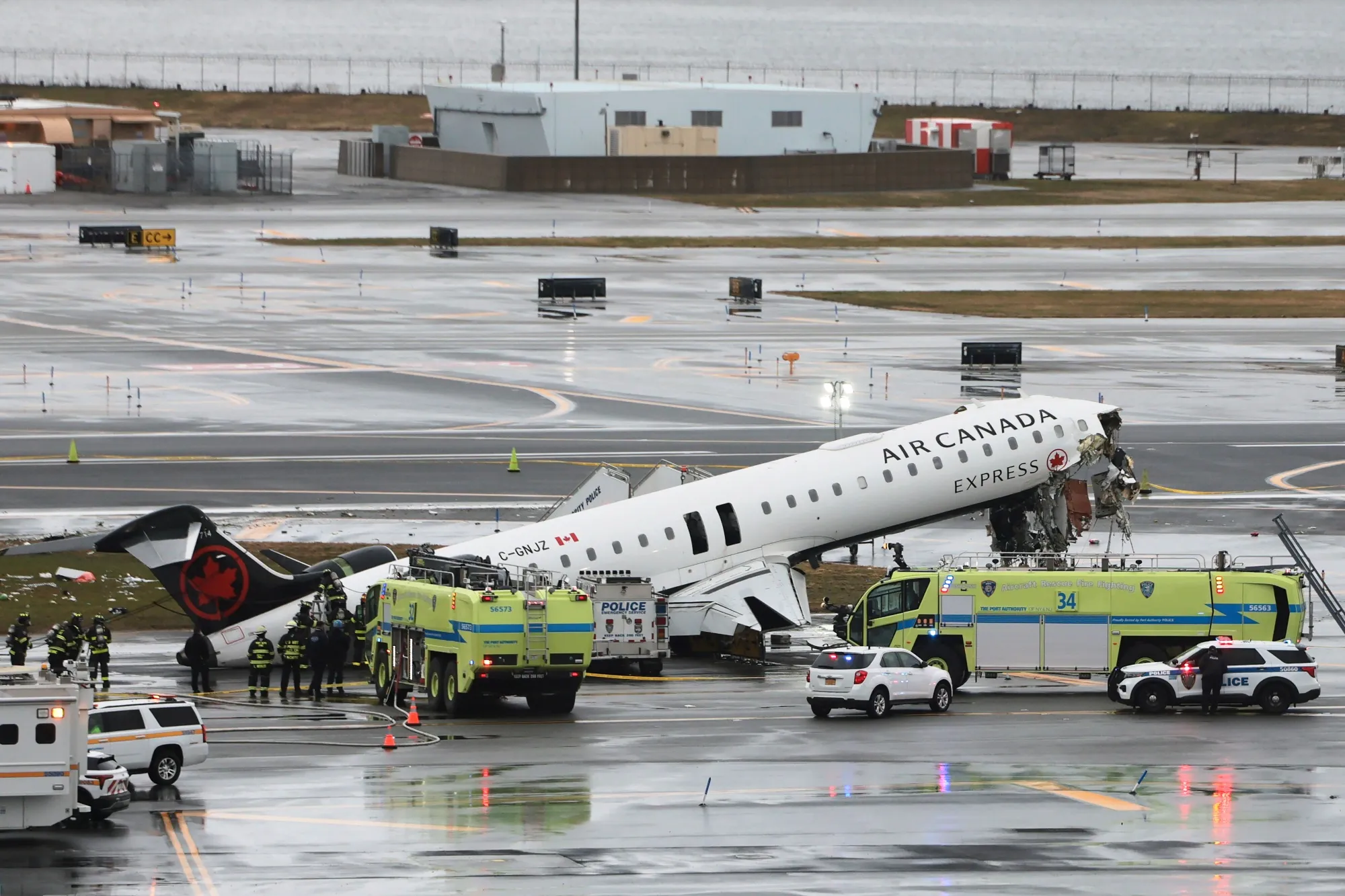 An Air Canada Express sits on the runway after colliding with a Port Authority fire truck at LaGuardia Airport in New York on March 23.