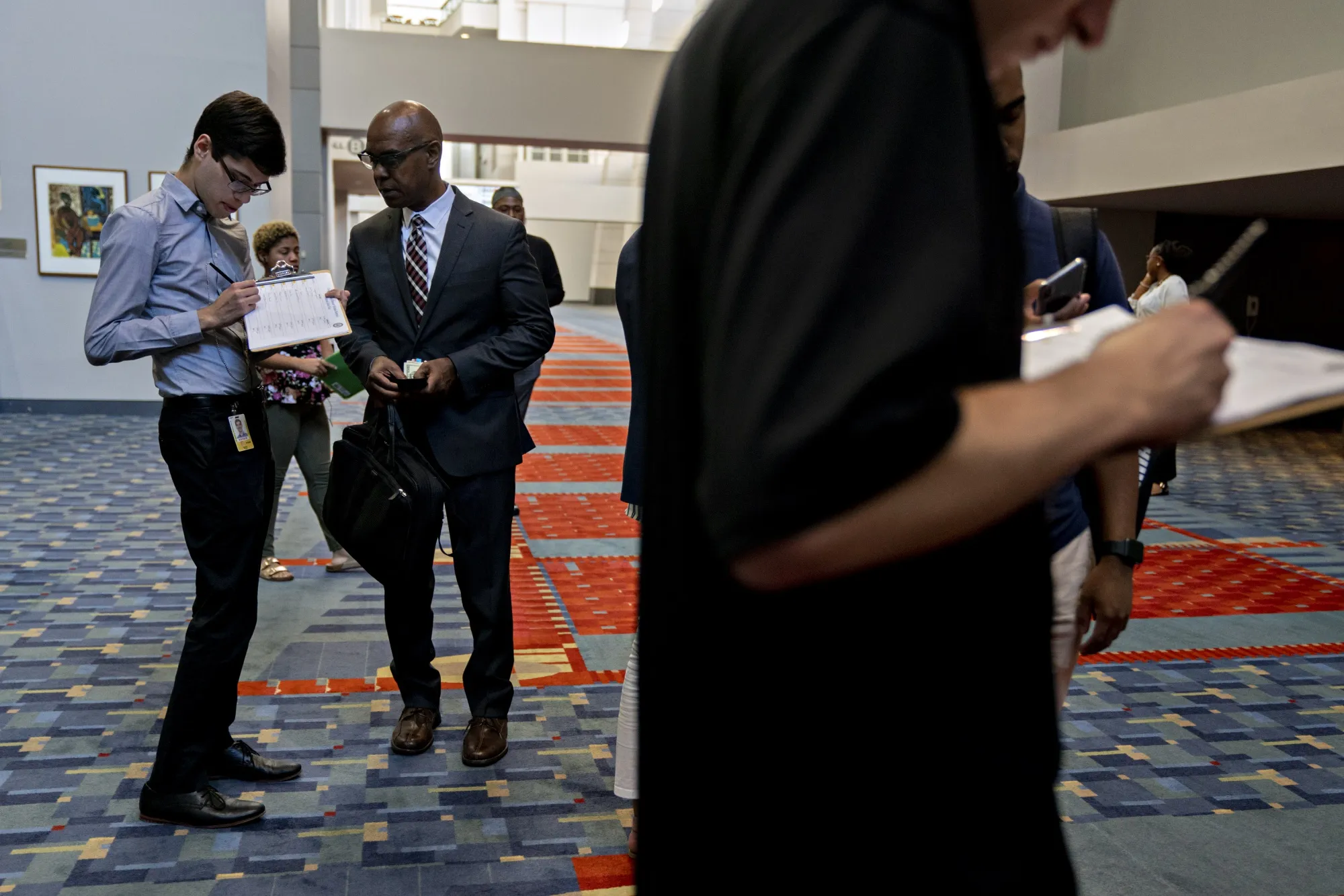 A job seeker checks in to a job fair in Washington, D.C.