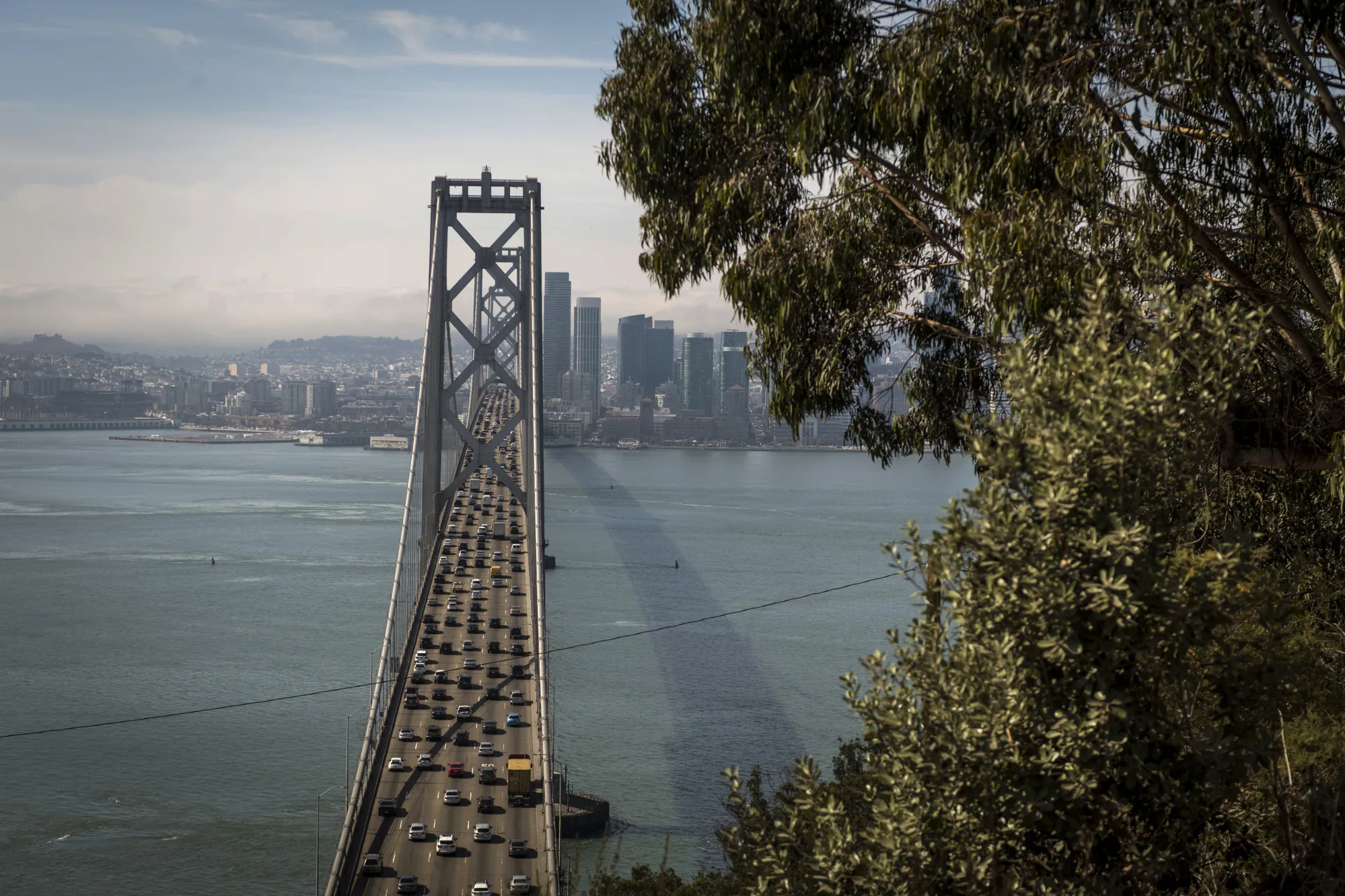 Vehicles travel on the Oakland-San Francisco Bay Bridge in San Francisco, California.