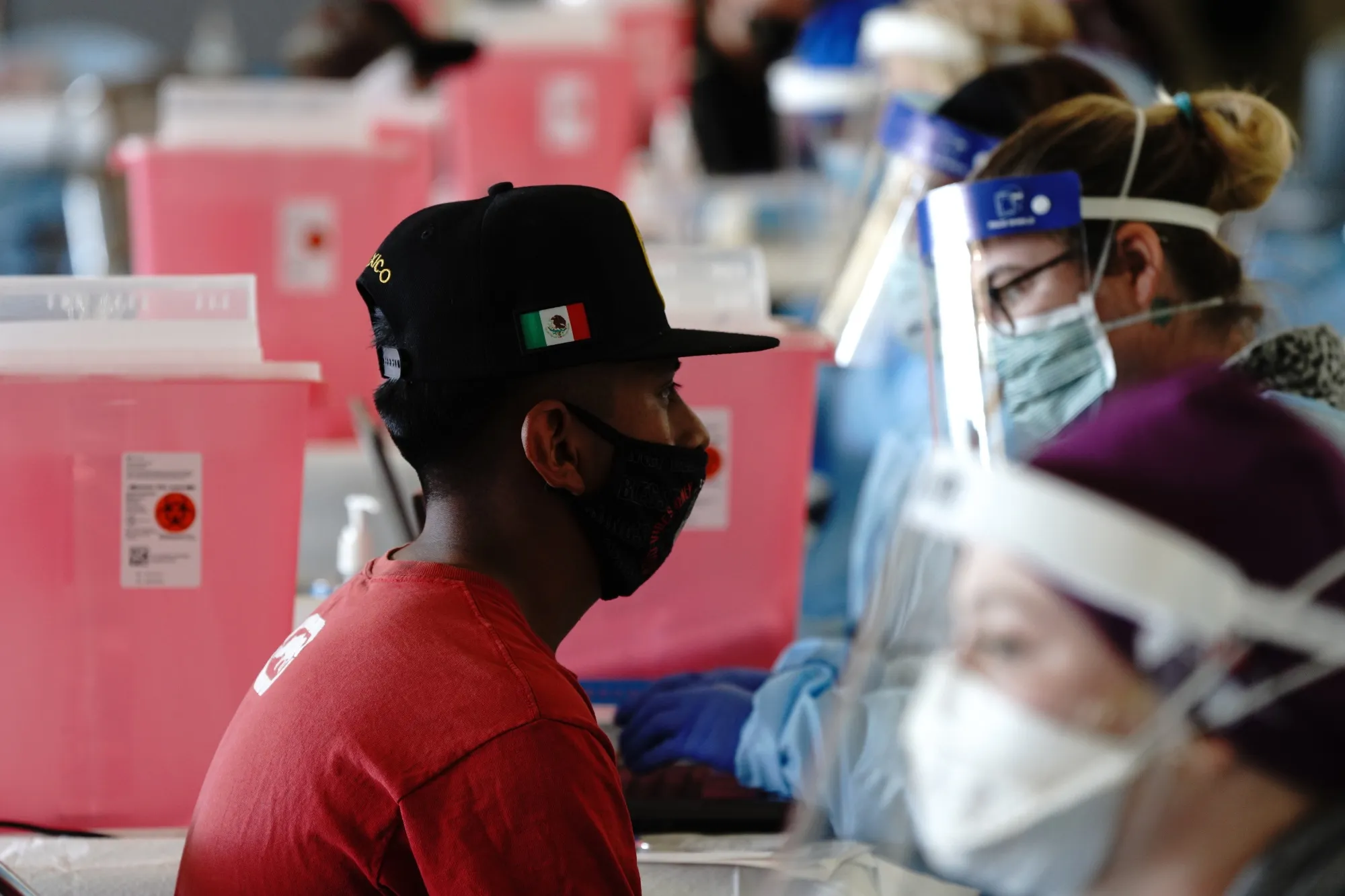 A farmworker waits to receive a dose of vaccine&nbsp;in Coachella, California, U.S.