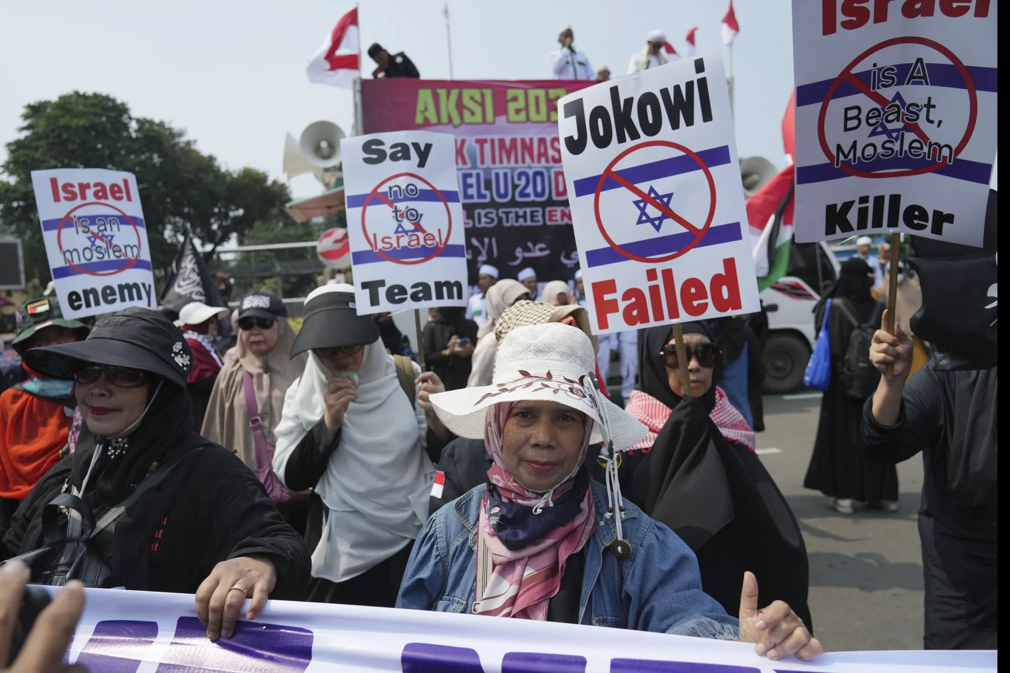 Protesters march during a protest in Jakarta, Indonesia, March 20.